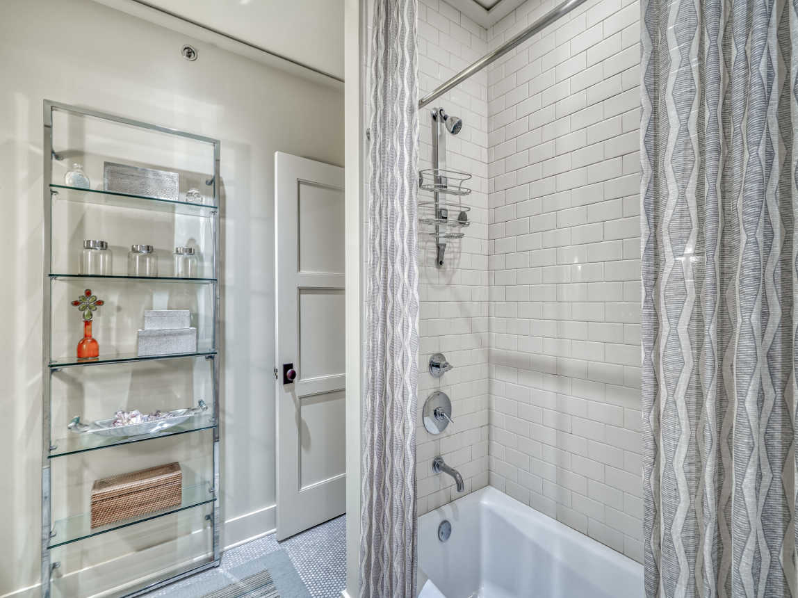 Jack and Jill Bathroom - Featuring a Tub/Shower Combo & Single Vanity