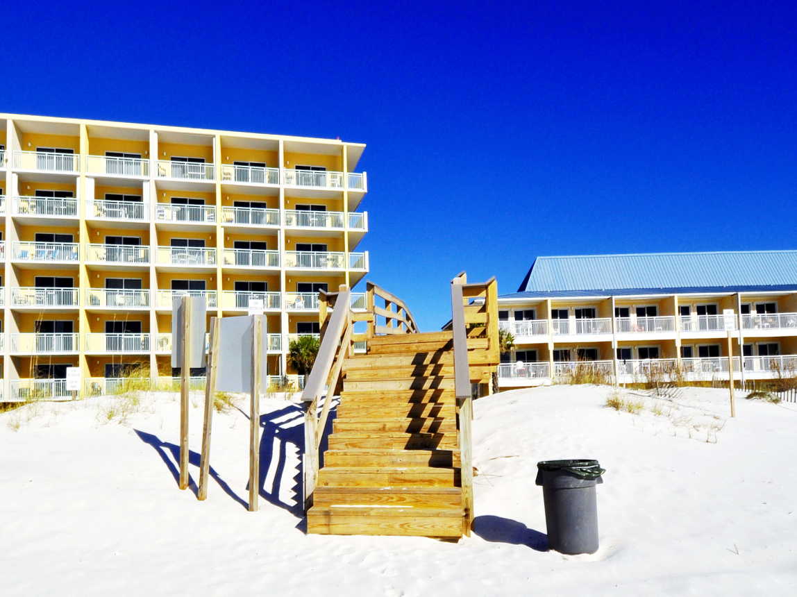 Sunset Cottages boardwalk to the beach