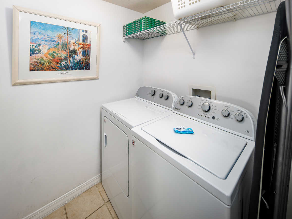 Laundry room with full size washer and dryer