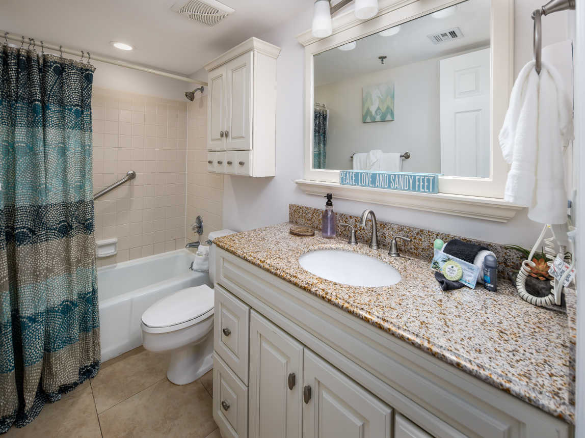 Second full size bathroom with shower/tub combo