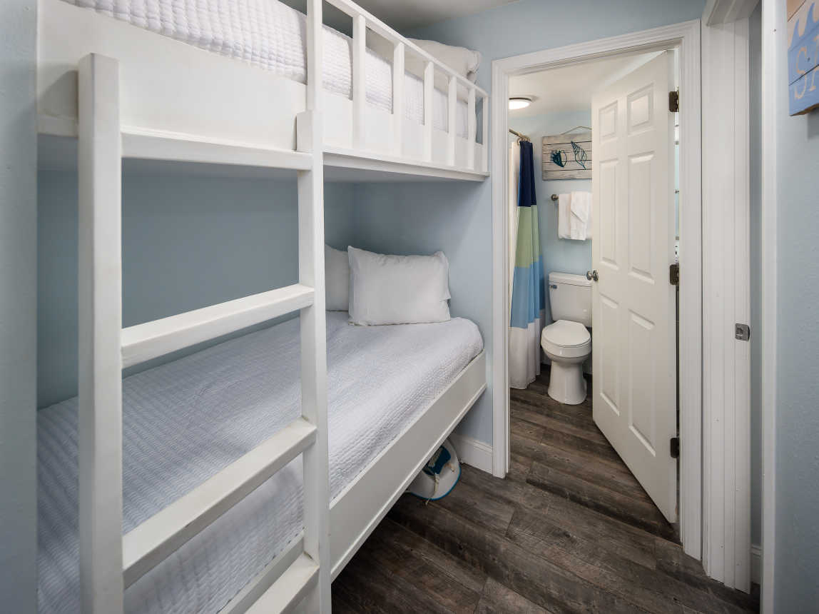 Twin size bunk beds in the hallway