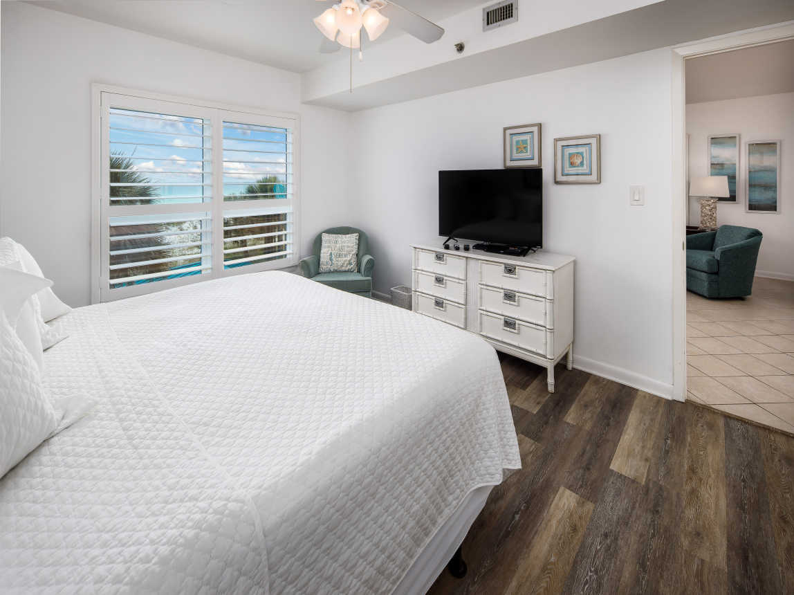 Master bedroom with TV and beach views