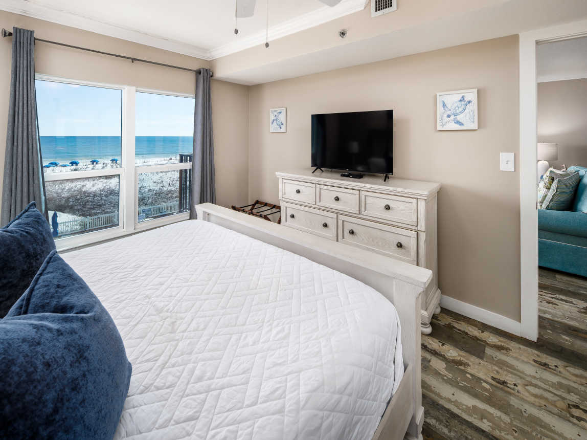 Master bedroom with TV and beach views