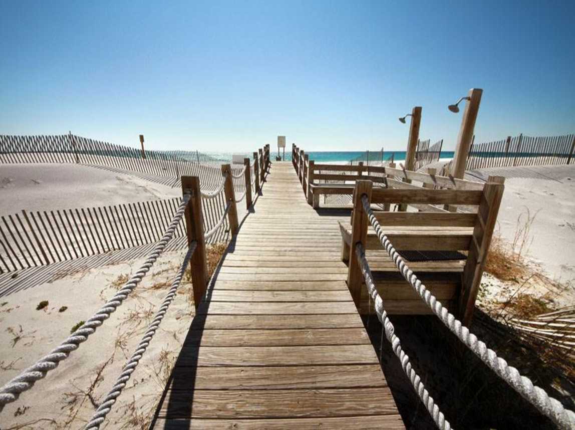 Boardwalk to the beach with showers