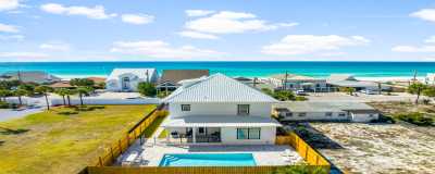 View of home, so close to the beach with a backyard oasis!