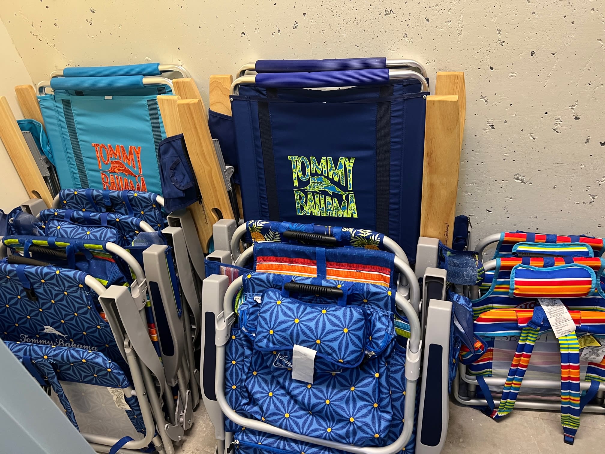 No need to pack the car or buy beach chairs here, the beach storage closet includes Tommy Bahama chairs and umbrellas for your use. (Items may vary)