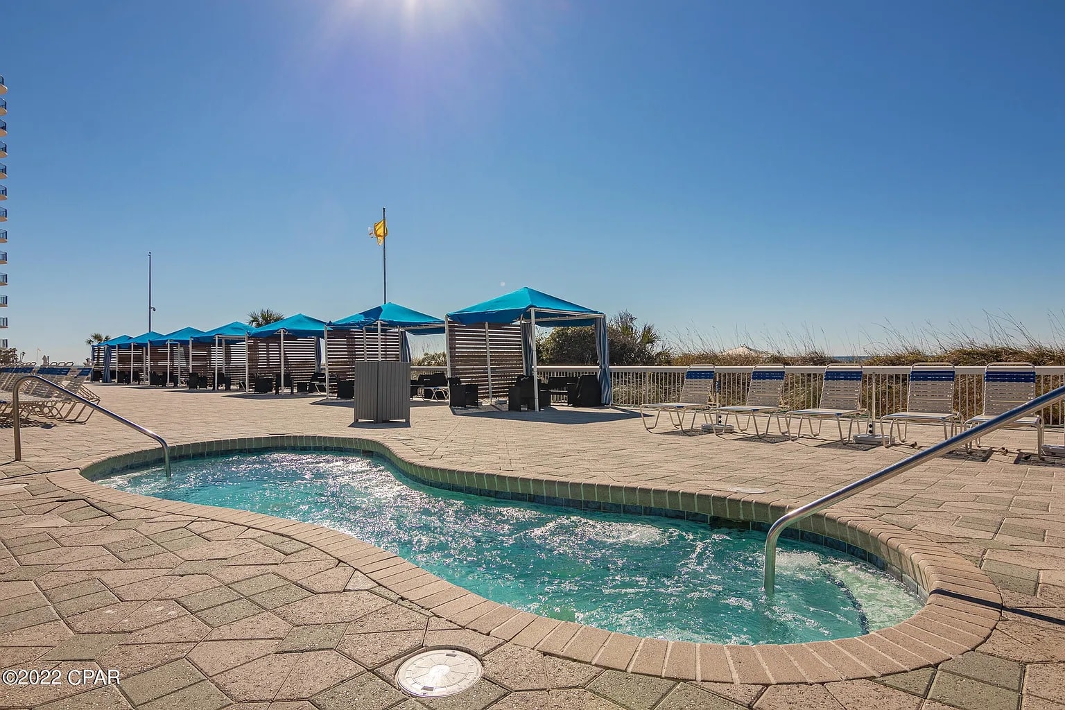 1 of 11 hot tubs resort wide, cabanas available to rent, some of the free lounge seating