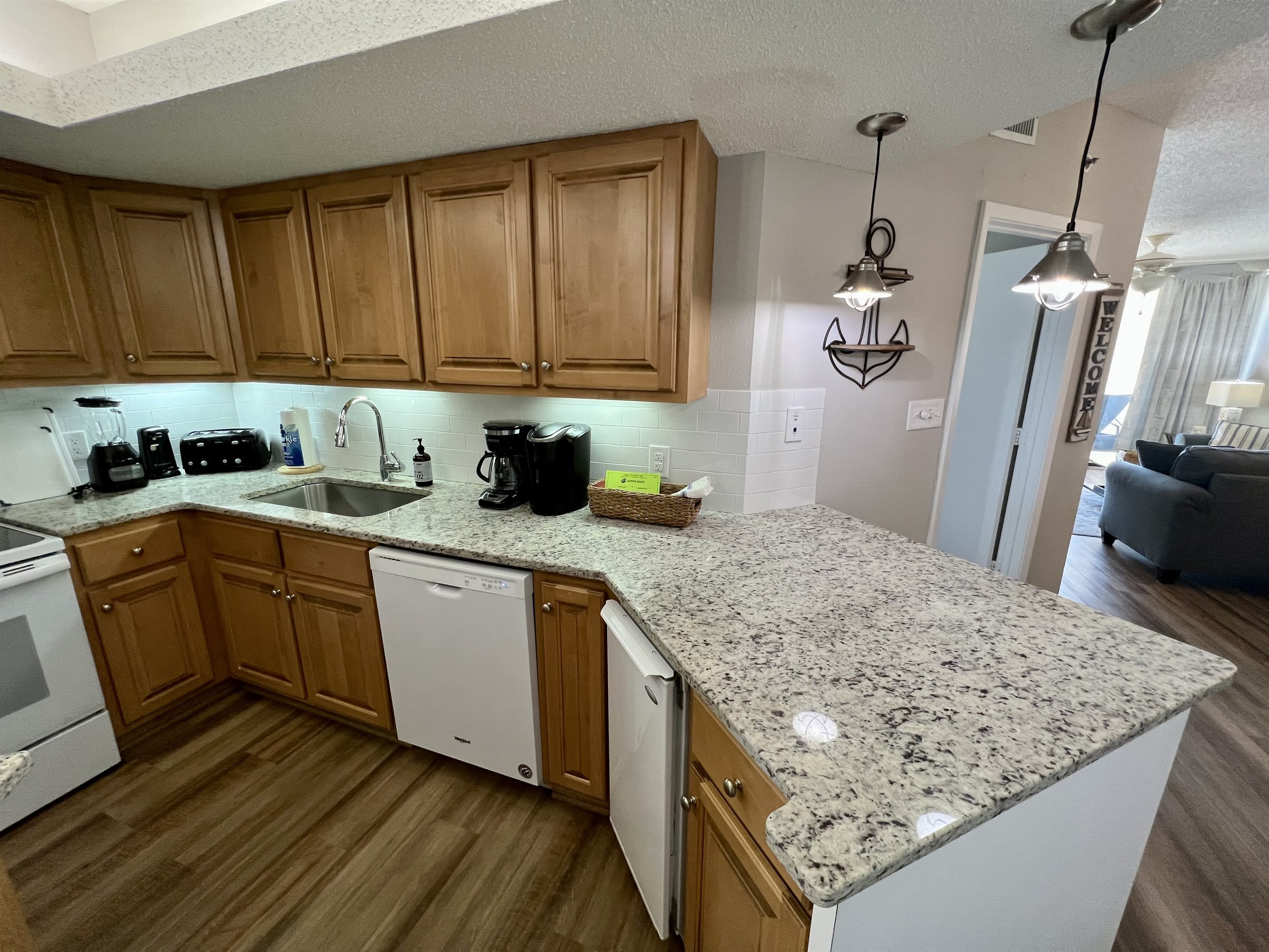 Wrap around countertop with 2 stools for extra seating
