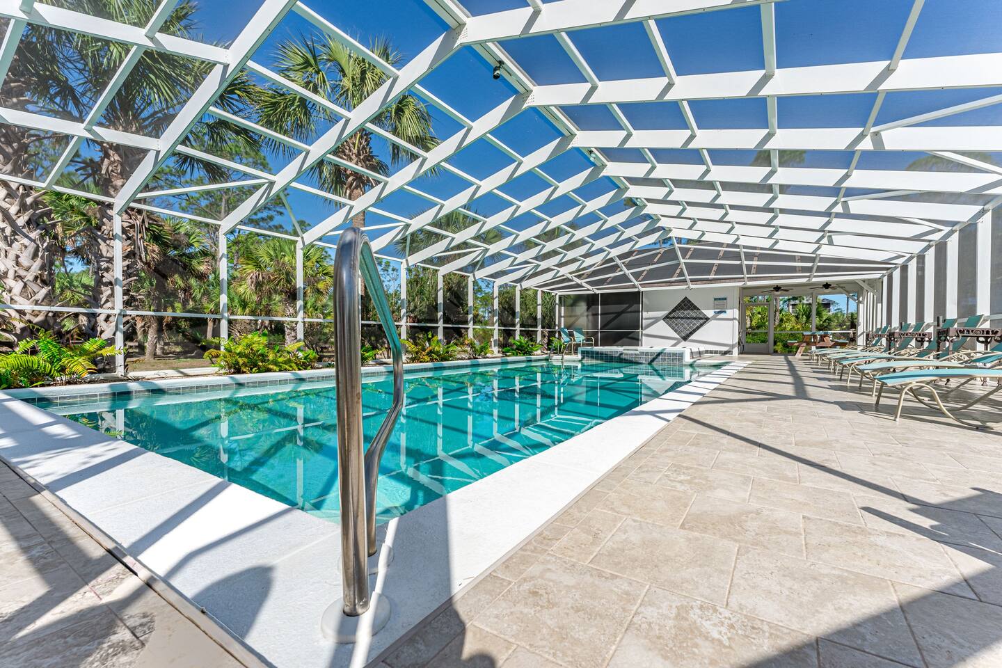 Soak in the Sun Without Bugs in the Large Screen-Enclosed Pool & Spa