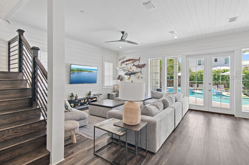 Spacious lounge with coastal accents and sunlit interiors.