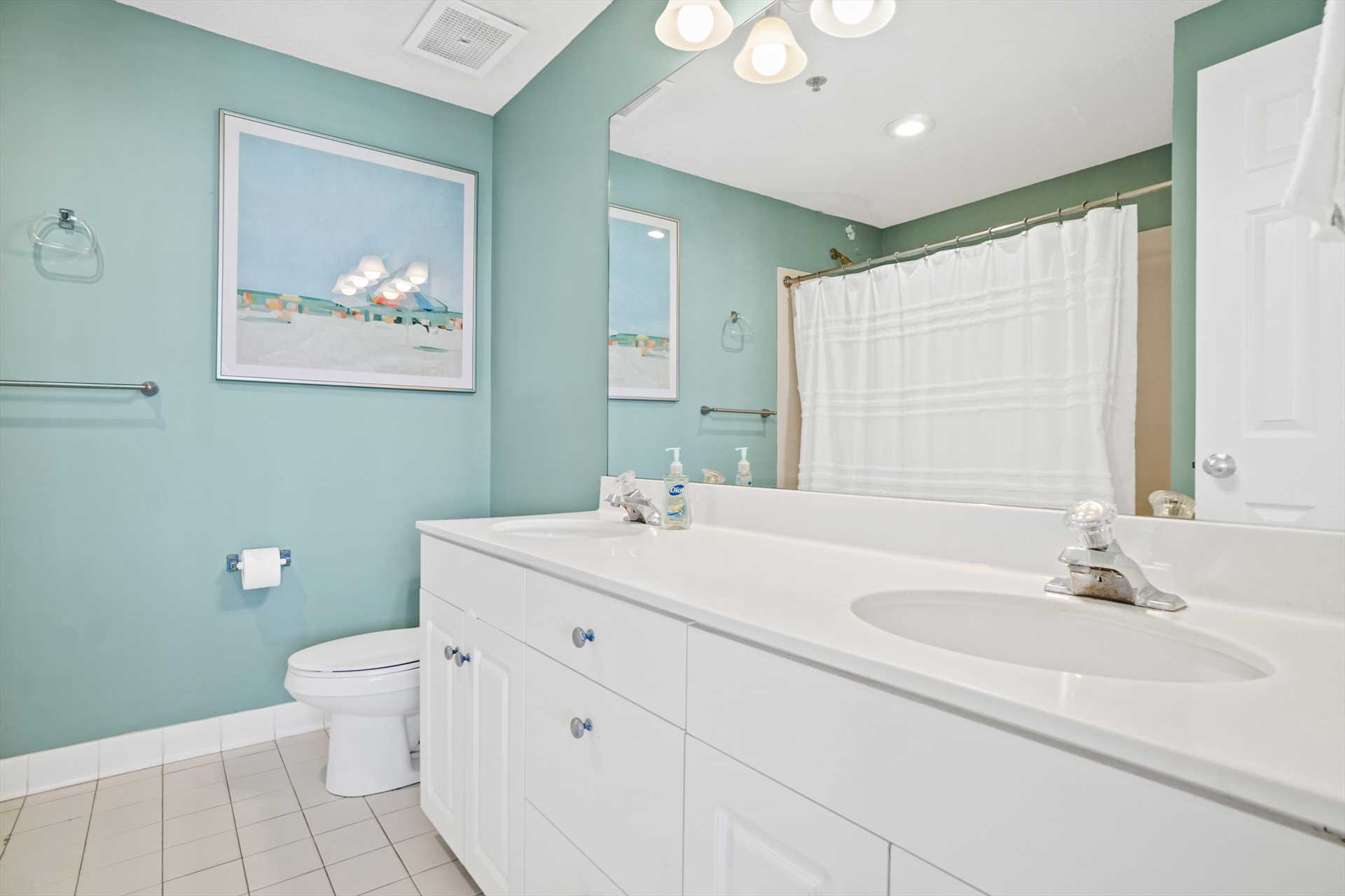 one of three bathrooms