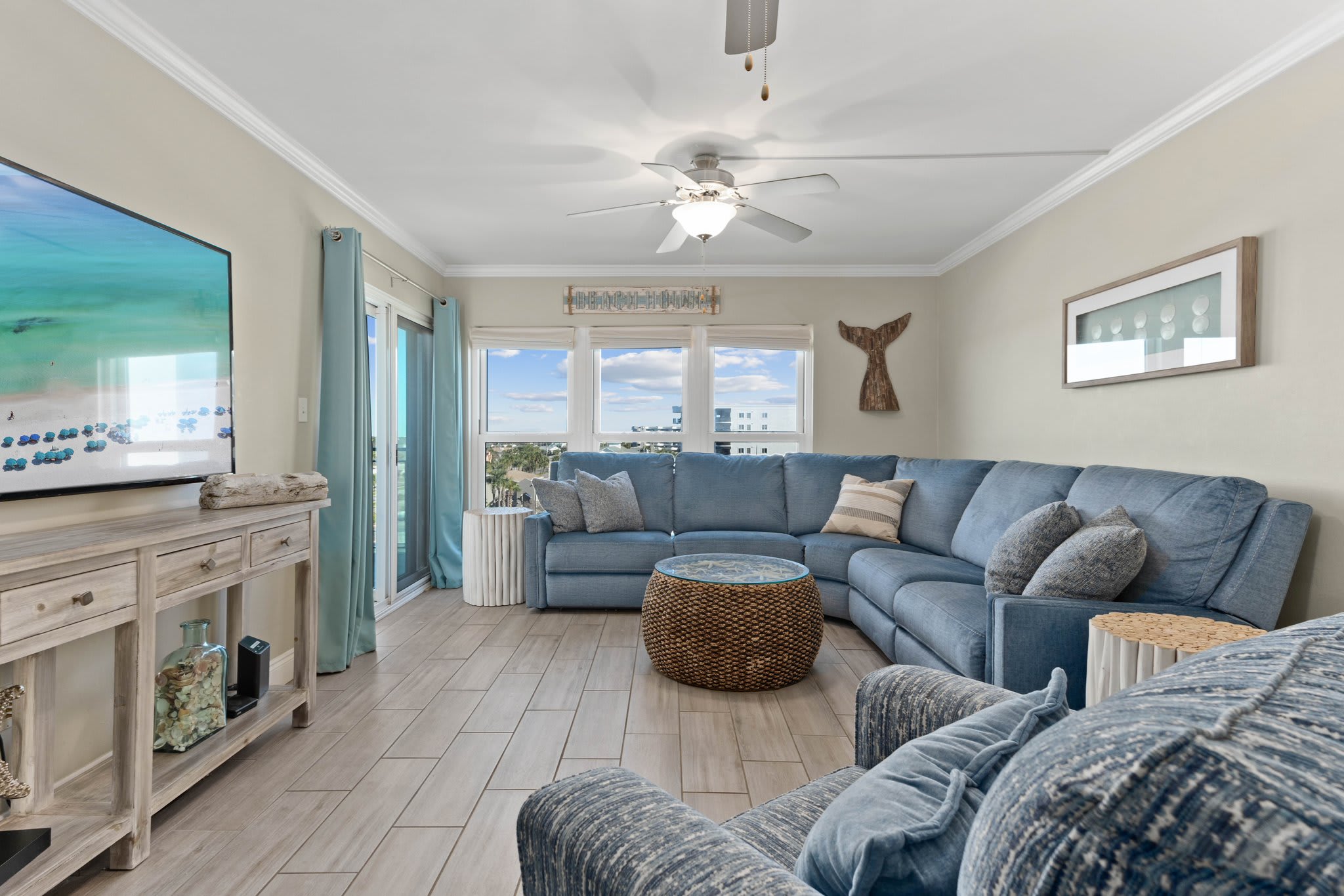 There is a sectional sofa that comfortably seats the entire family.