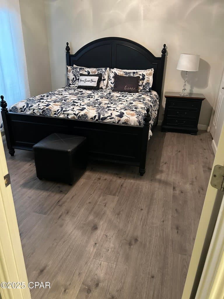 Master bedroom with king bed and brand new lvt flooring!