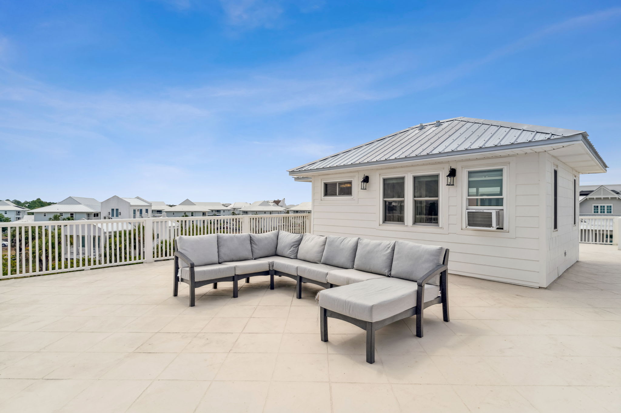 Guests enjoy the Over sized Balcony with Stunning Lake & Gulf views!