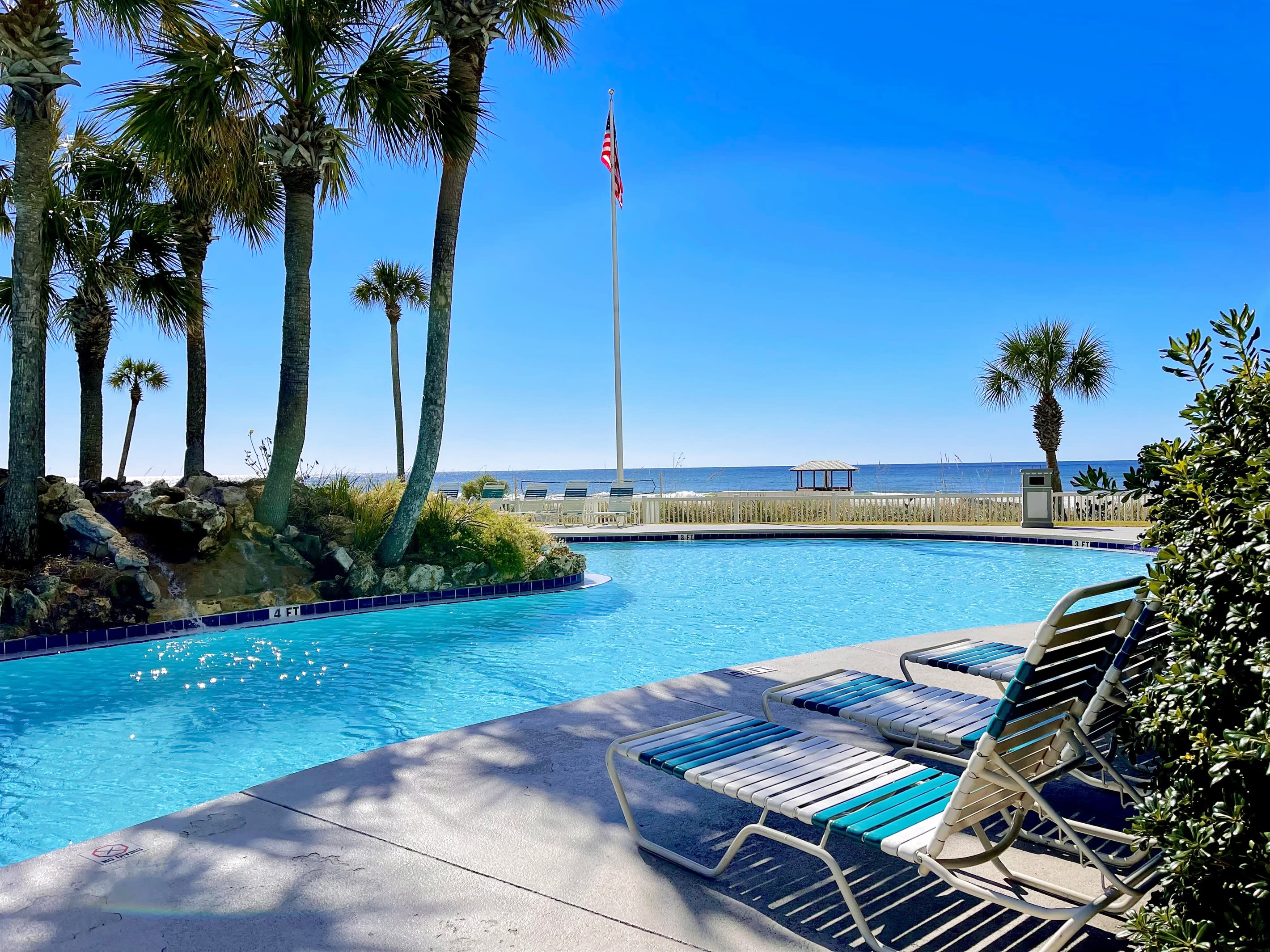 Lagoon pool on the beach with plenty of adjustable seating