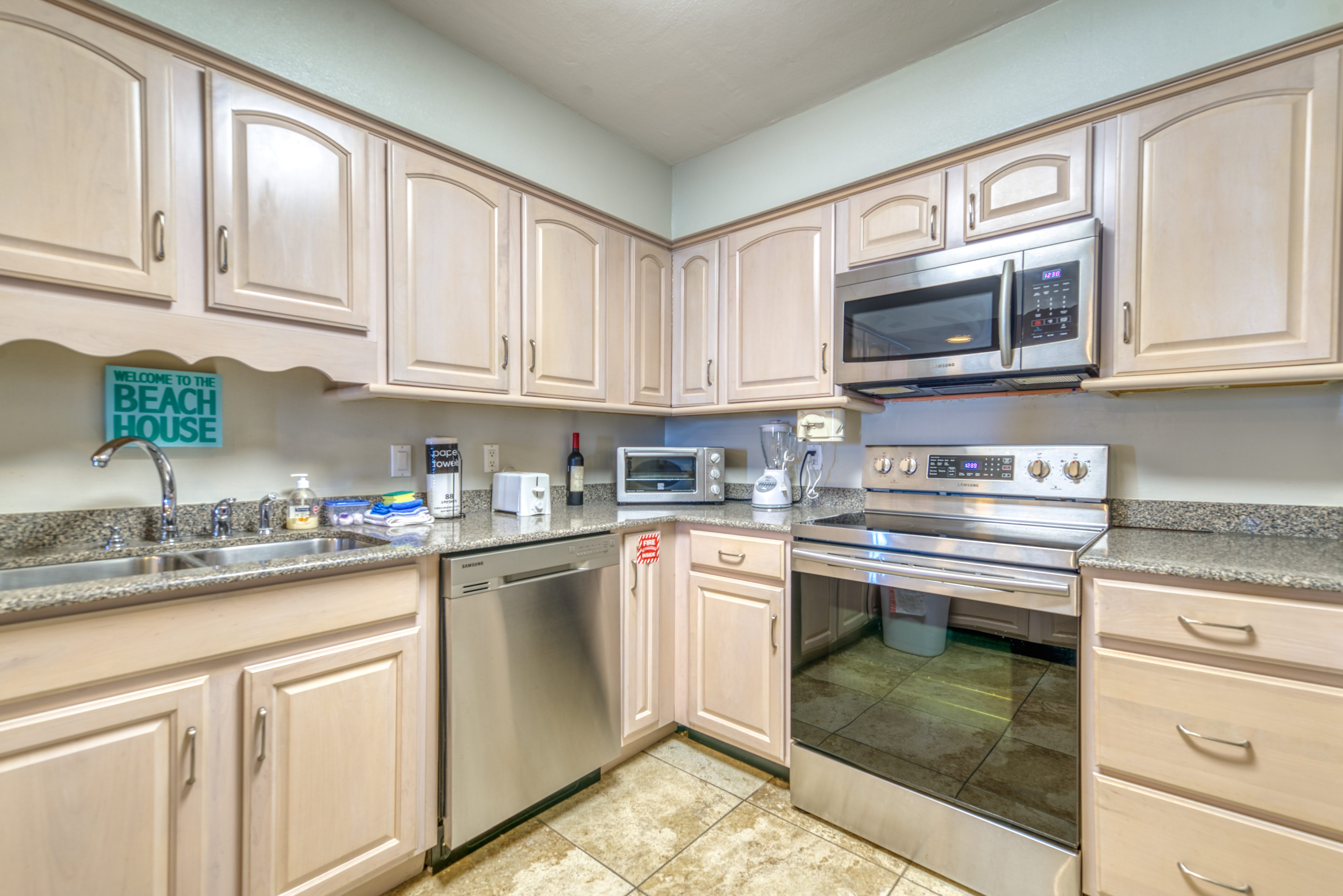 Cook up your favorite meals in this cozy kitchen.