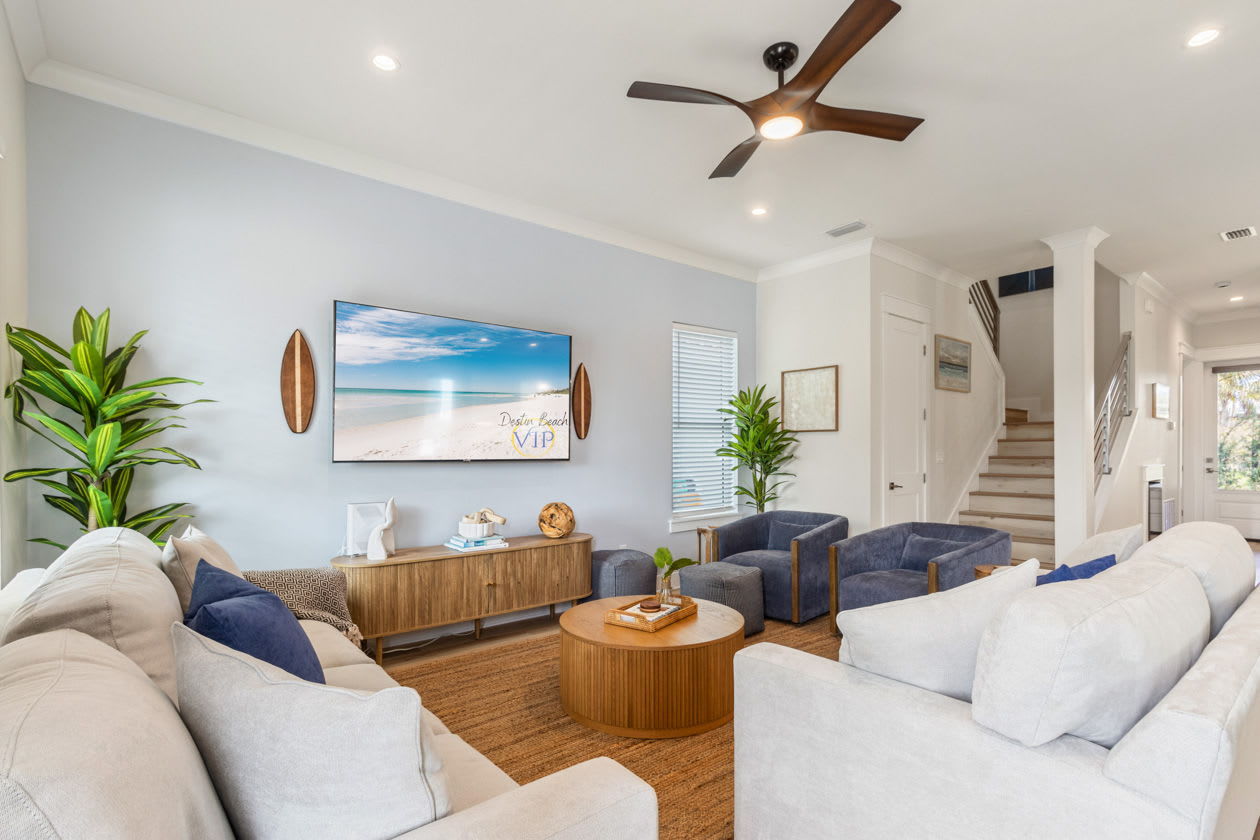 Spacious living area with coastal decor