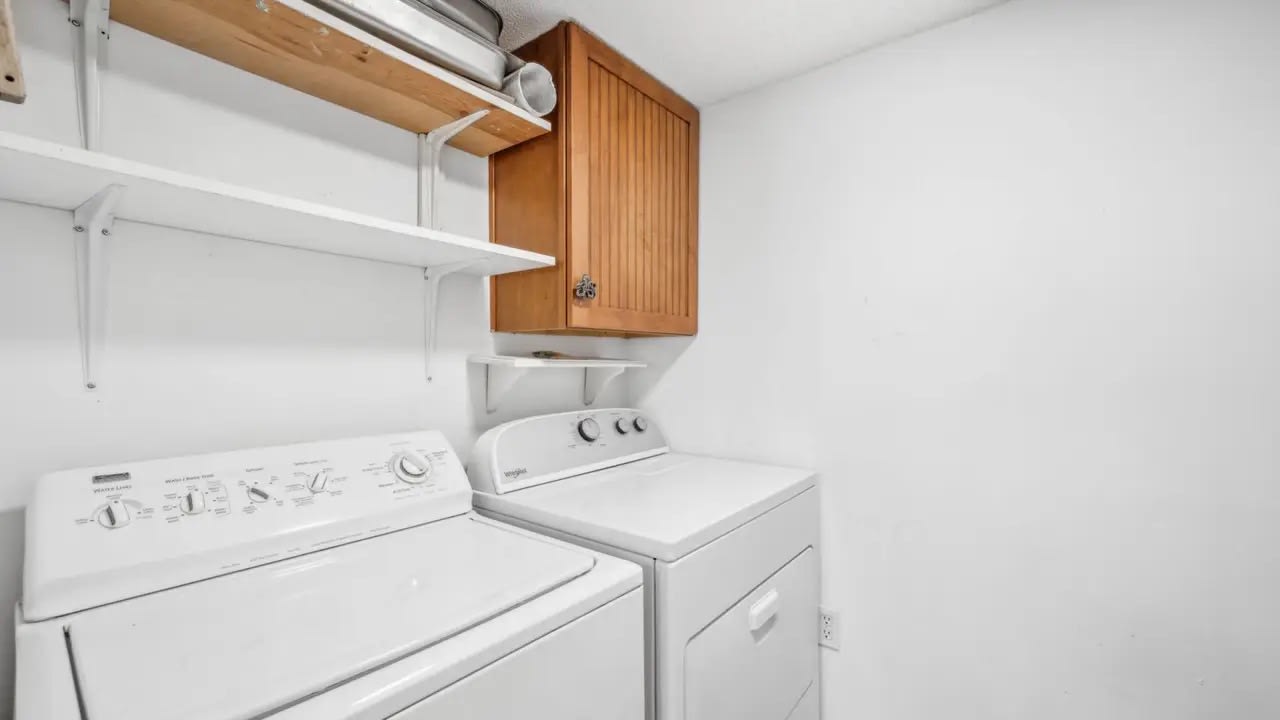 Laundry room with full sized washer and drier