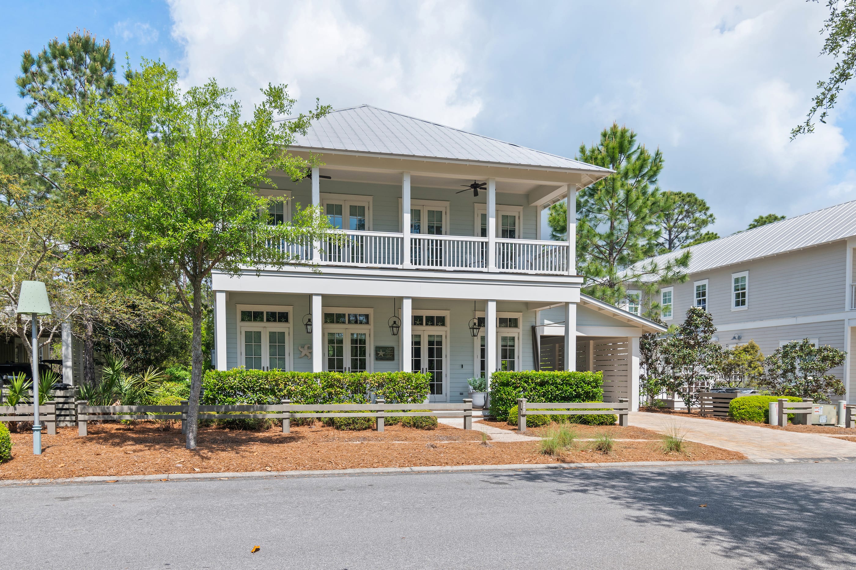House is located on a quiet street in Watercolor