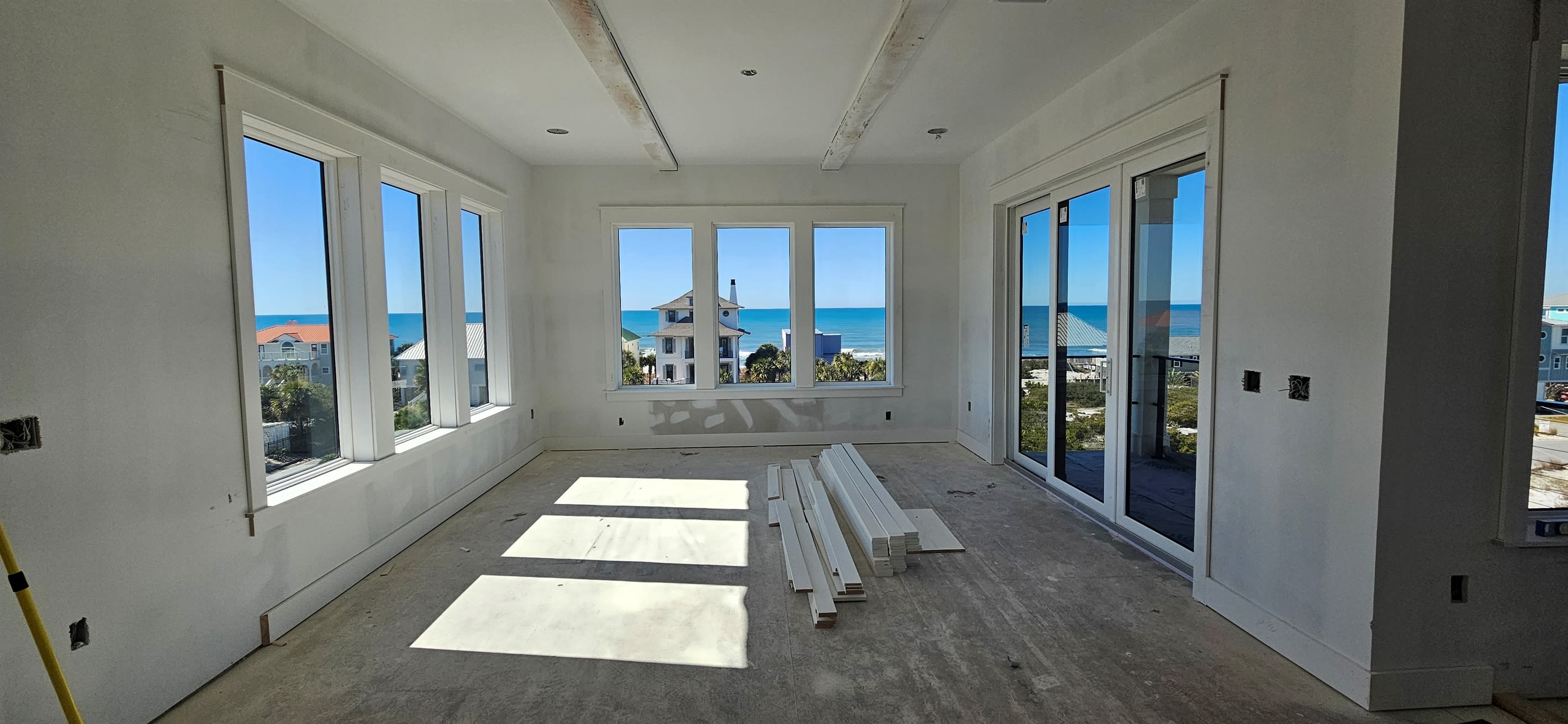 Dining Room with 180 degree gulf water views, dining table seating 14. 6-7 additional seating at the breakfast table and seating 7 at the kitchen island. All within an open concept room for dining together in 1 space.