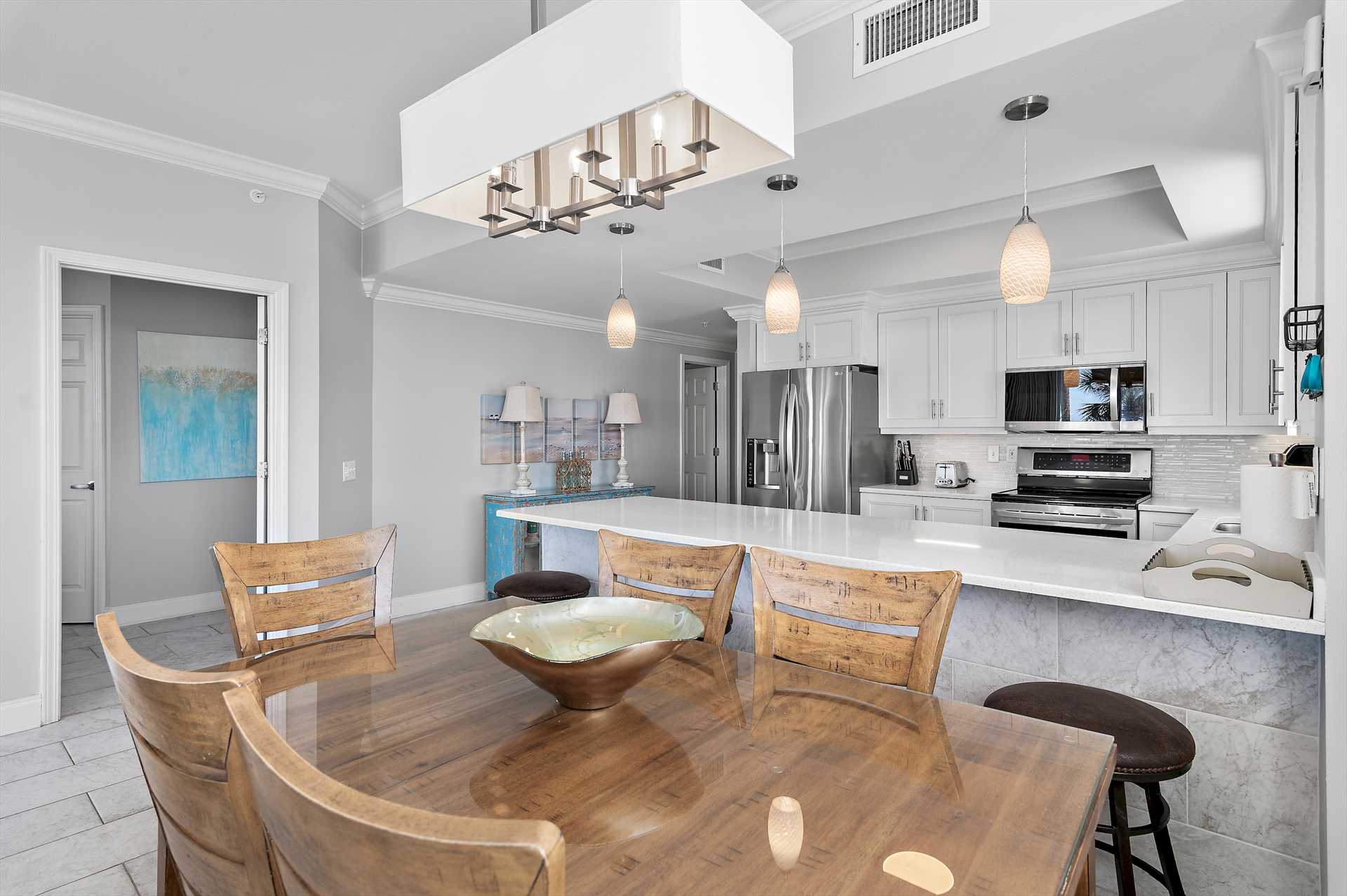 Family-style dining made easy with large table and breakfast bar