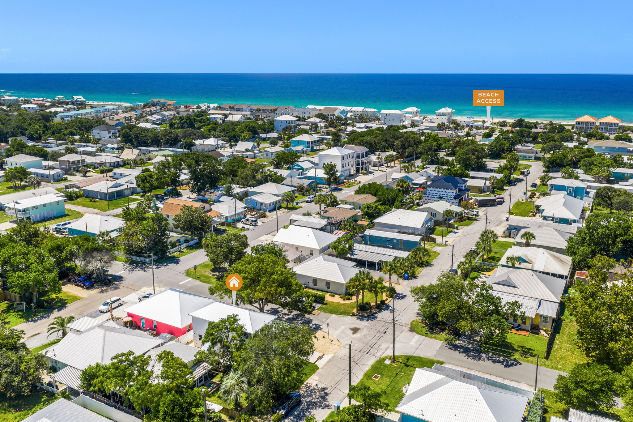 The beach is just a stone's throw away from our home.