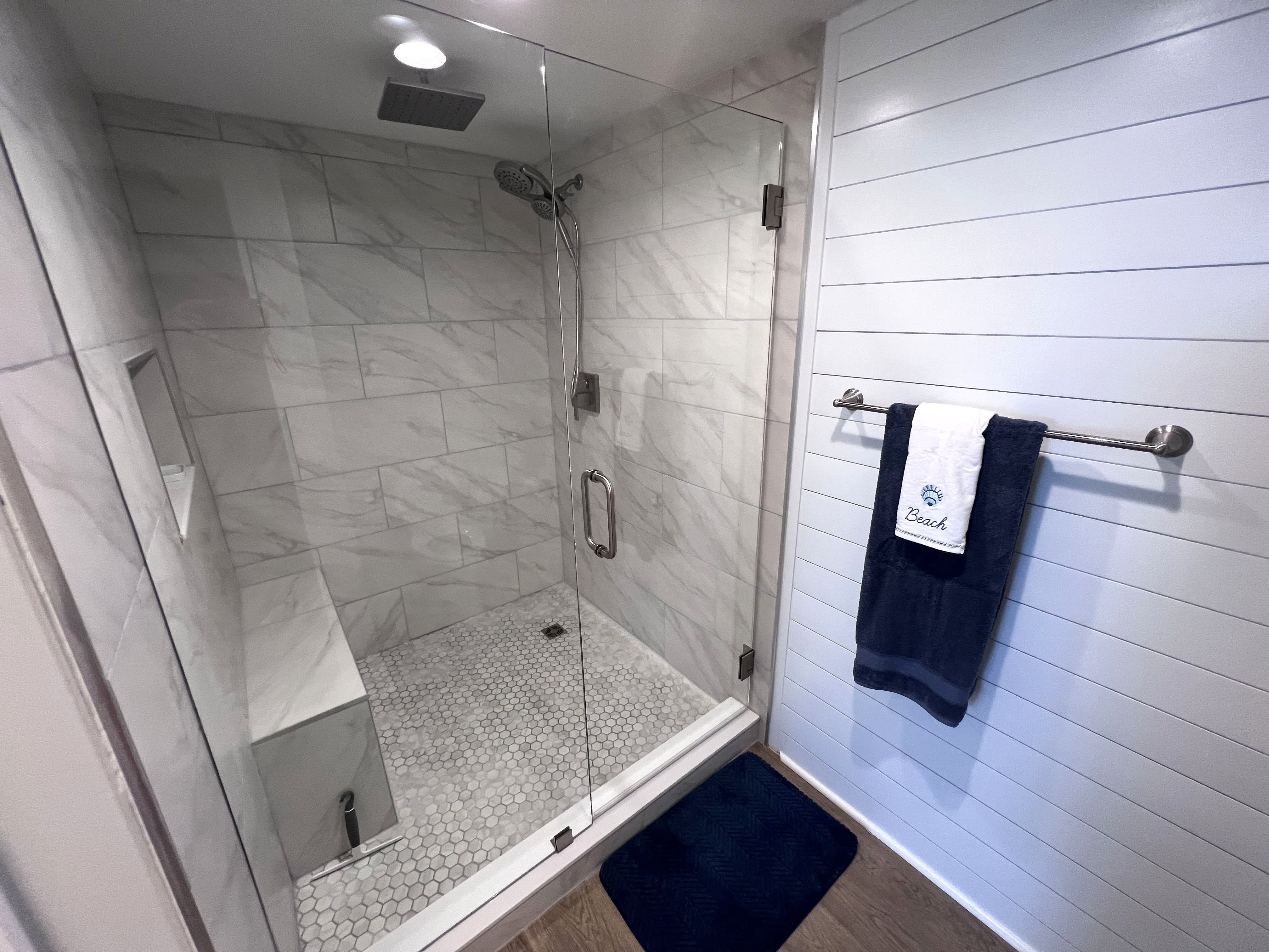 Newly renovated Master Bath with large walk-in shower with multiple shower heads