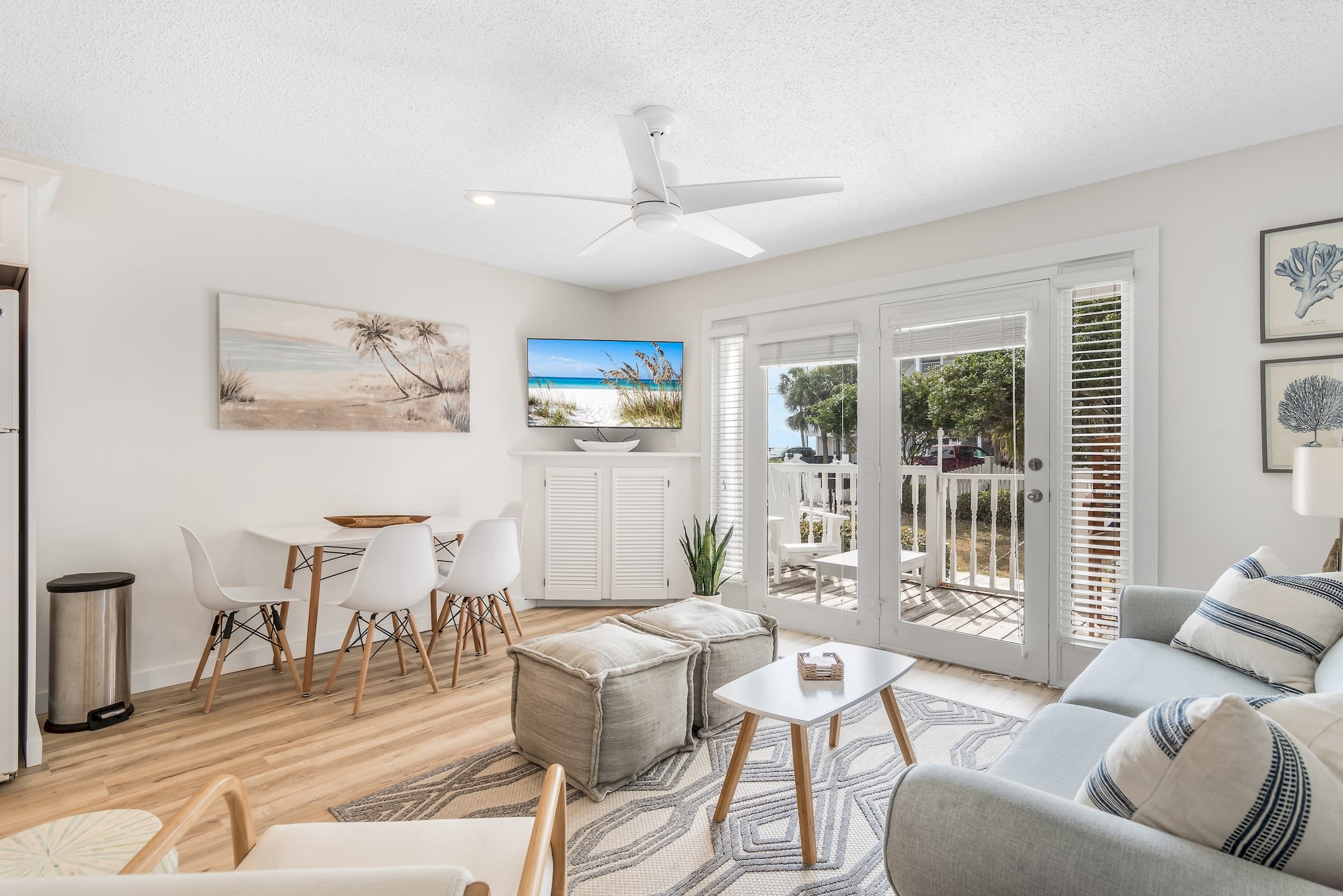 Large living room with ample seating, and a table to enjoy a home-away-from-home meal together. 