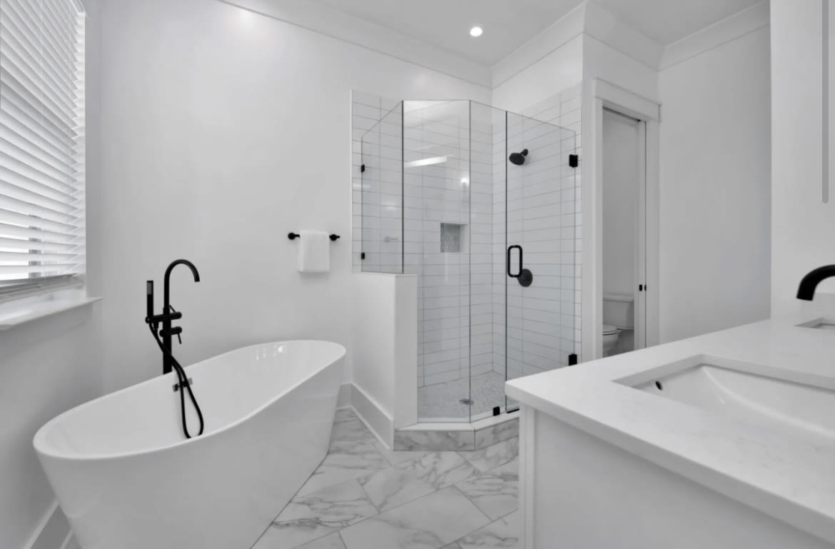 Primary bathroom with soaking tub and walk in shower