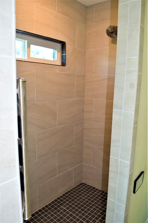 walk inshower in master bedroom with grab bars