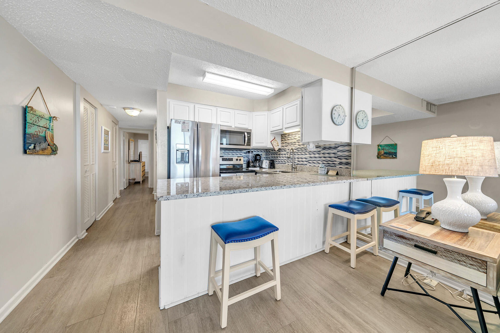 Dining area w/ extra counter seating for easy meals together.