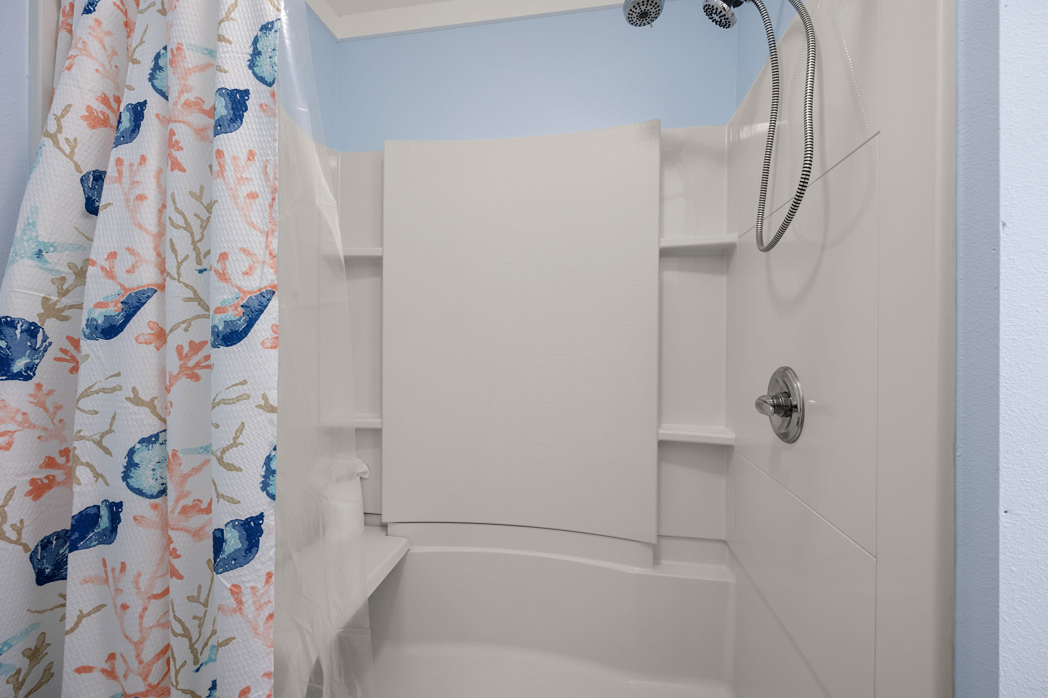 Master Bathroom with low entry access and shower seat