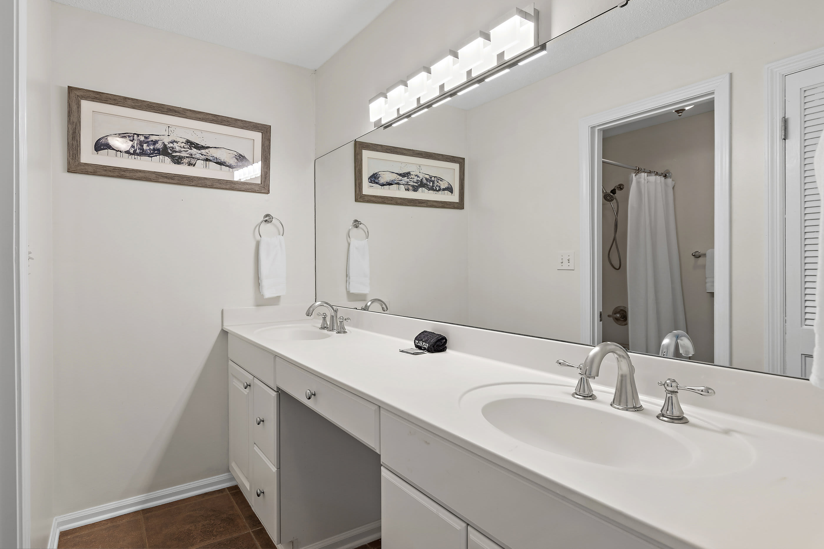 Master bath with twin vanities and separate shower