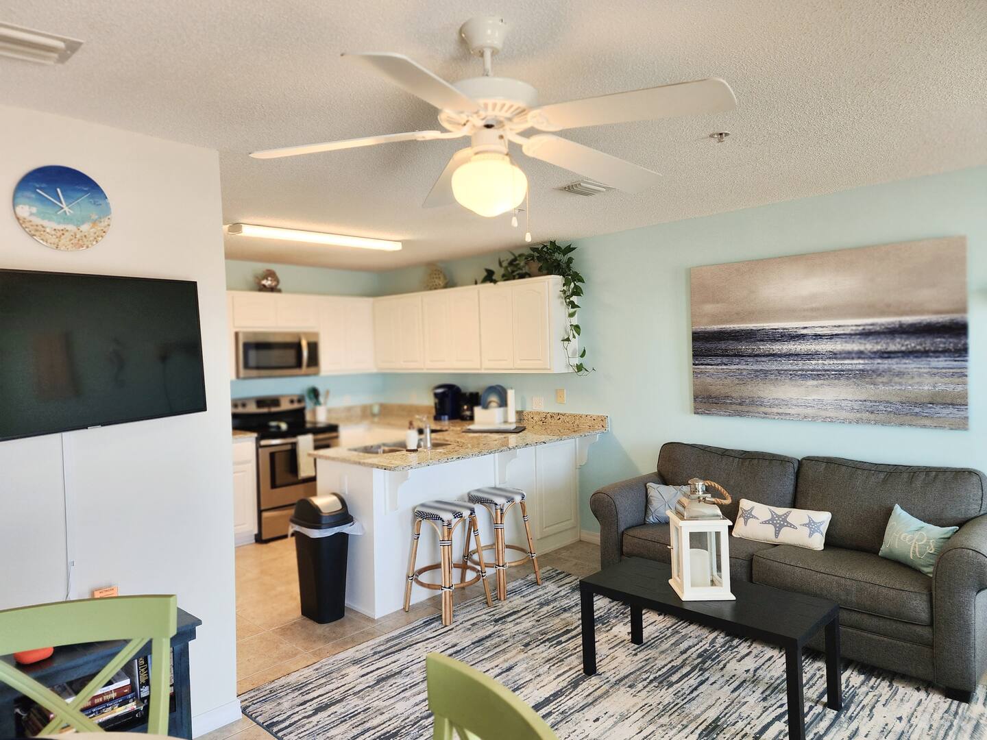 Kitchen open to living and dining.