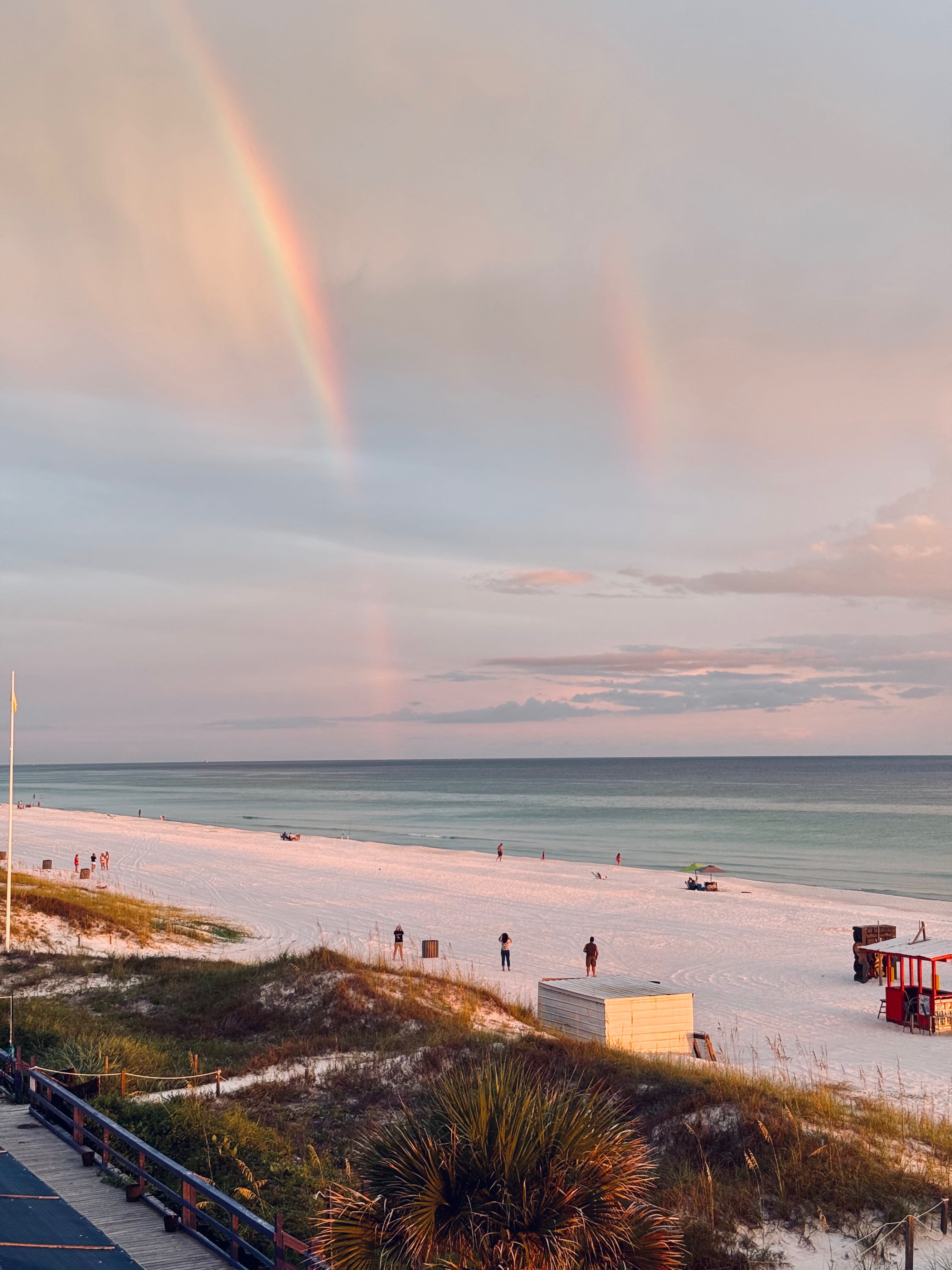 Sunset magic with pink skies and double rainbows over the Gulf. These unforgettable evenings are why guests return year after year&mdash;your front-row seat to nature&rsquo;s best show.