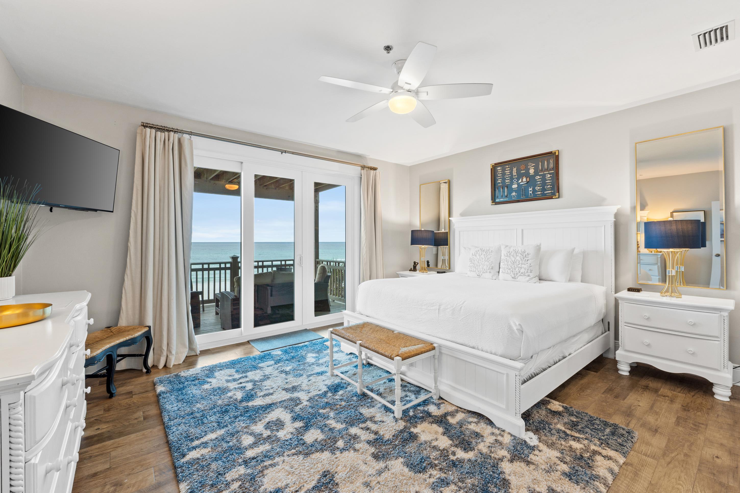 The second master king bedroom with private balcony access and sweeping Gulf views. Wake up to the sound of the waves and end your day with sunset skies&mdash;all from the comfort of your plush retreat.