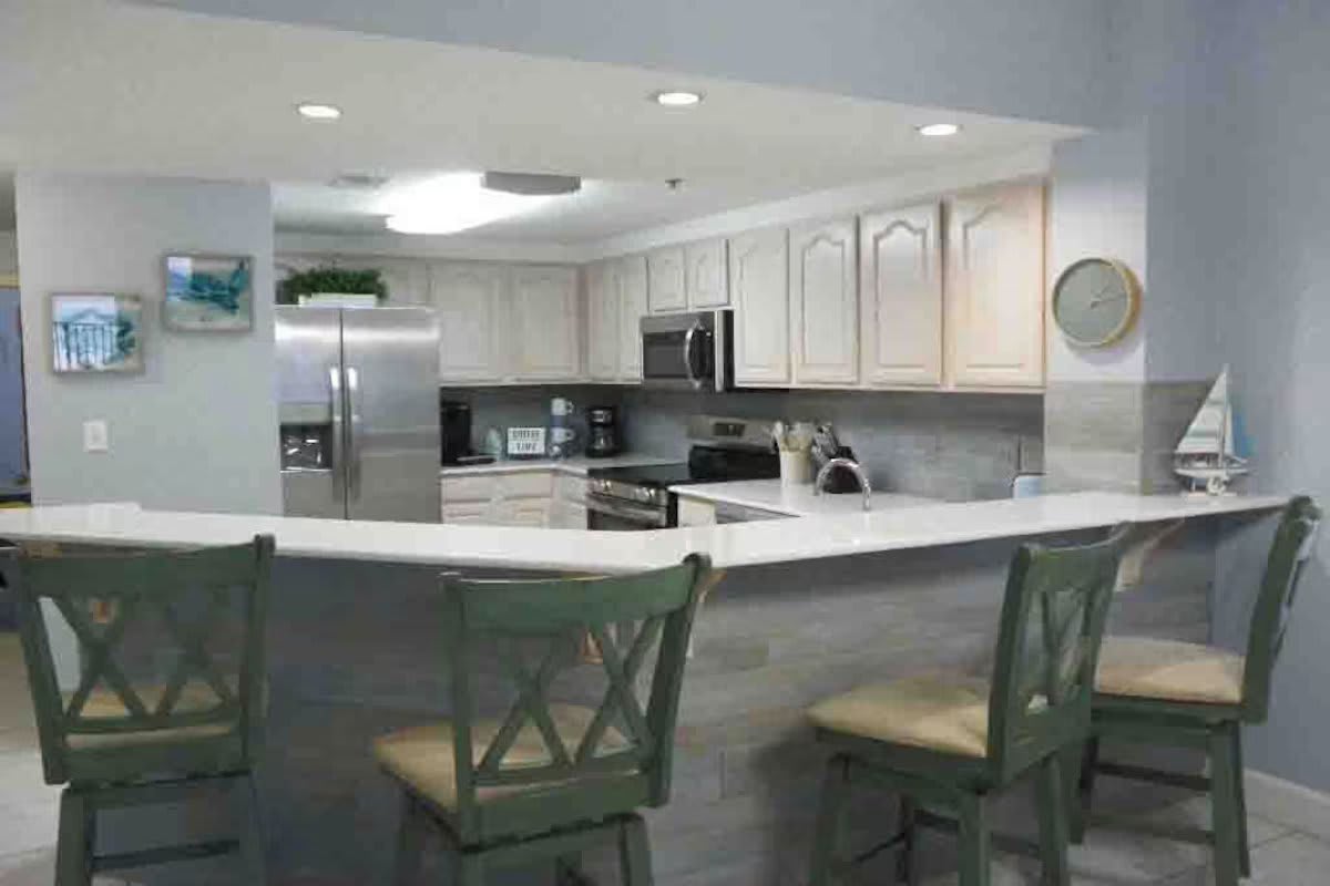 Eat at bar with 4 comfortable chairs