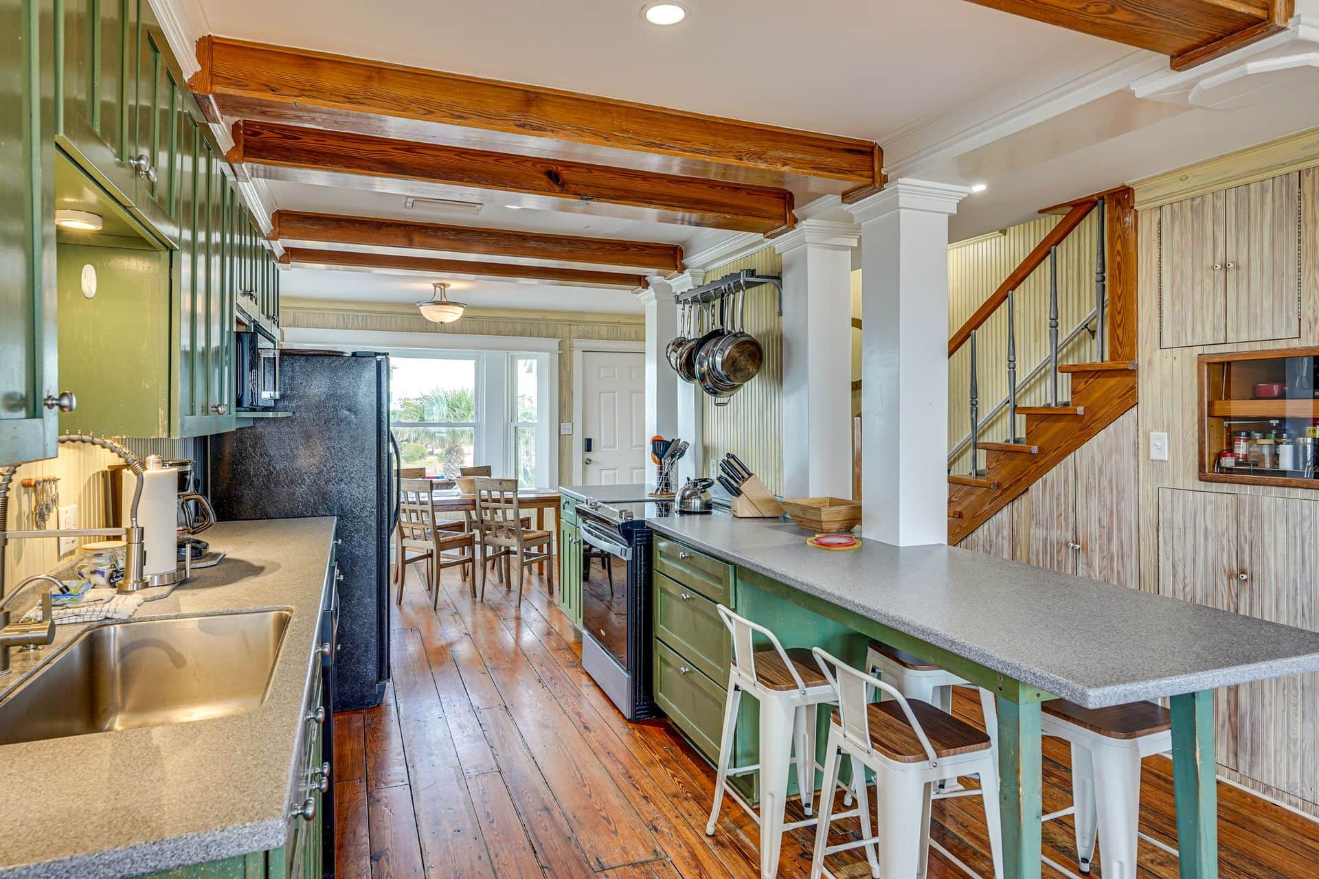 Great kitchen layout with additional seating at island bar.