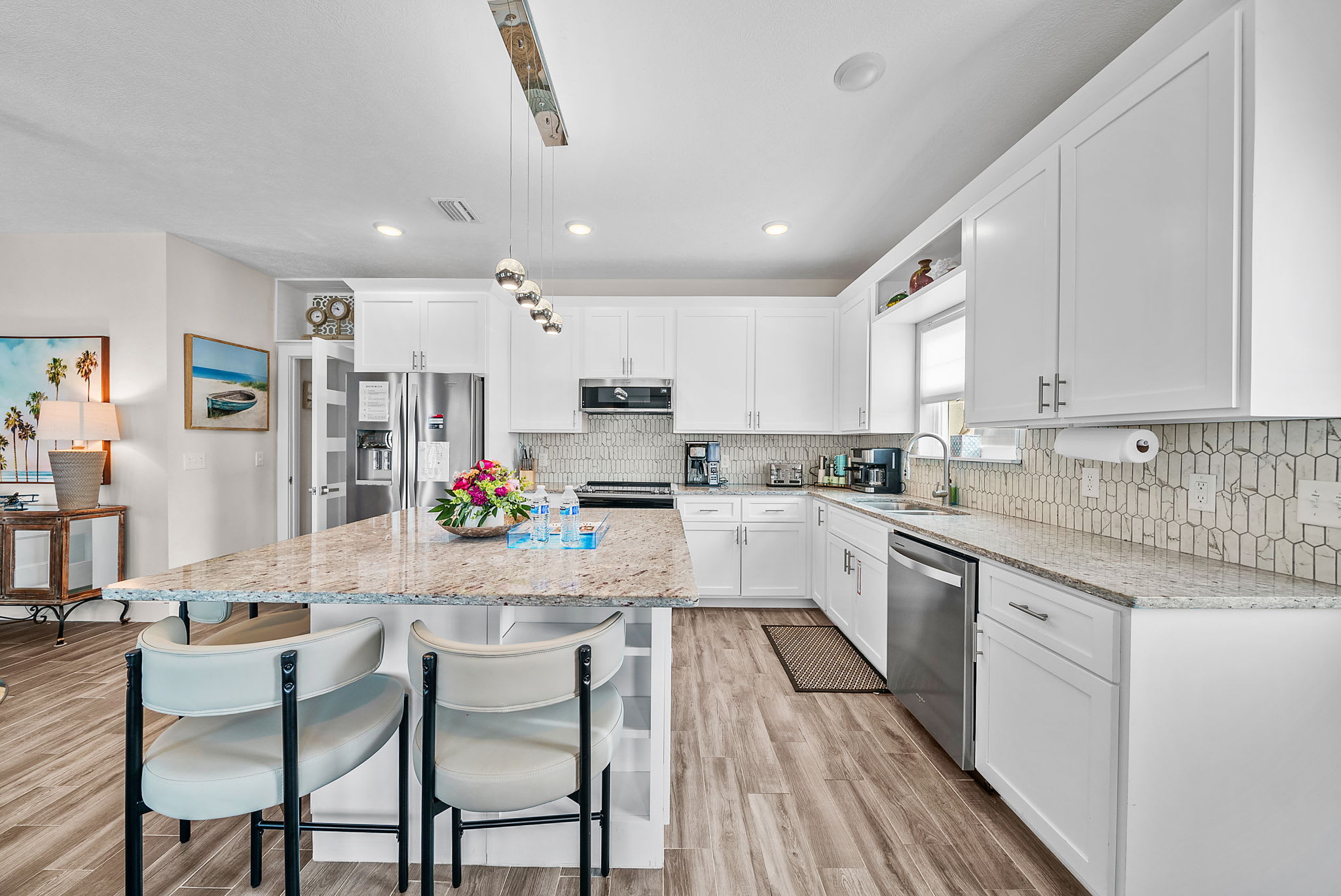 Fully equipped kitchen with double door fridge with freezer, Microwave, Oven and small appliances Rice cooker, bread toaster, kettle, blender, pots and pans, cutleries. Plastic dinnerware for kids.