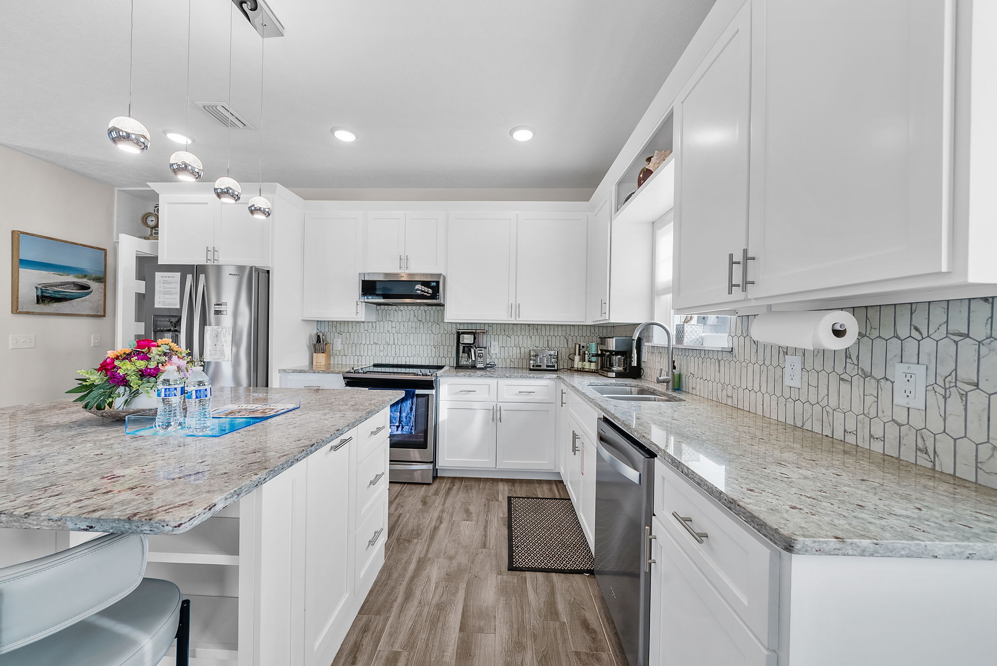 Fully equipped kitchen with double door fridge with freezer, Microwave, Oven and small appliances Rice cooker, bread toaster, kettle, blender, pots and pans, cutleries. Plastic dinnerware for kids.