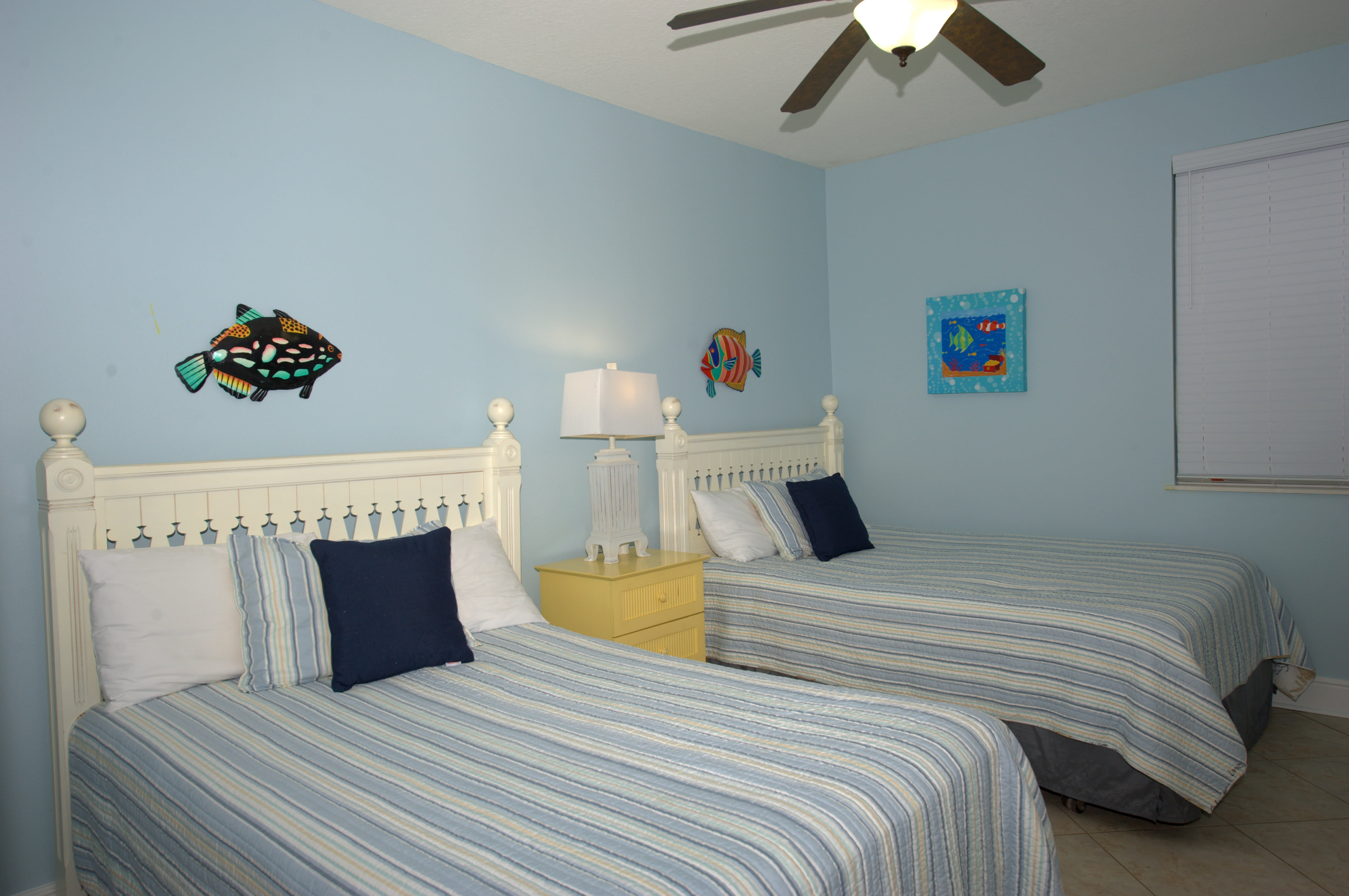 Our large third bedroom has 2 queen beds!