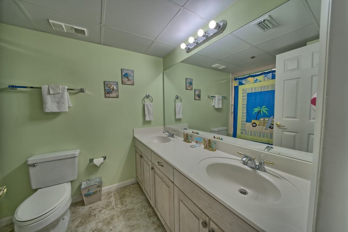 Other master bath with double vanity and large step in shower tub. New floor