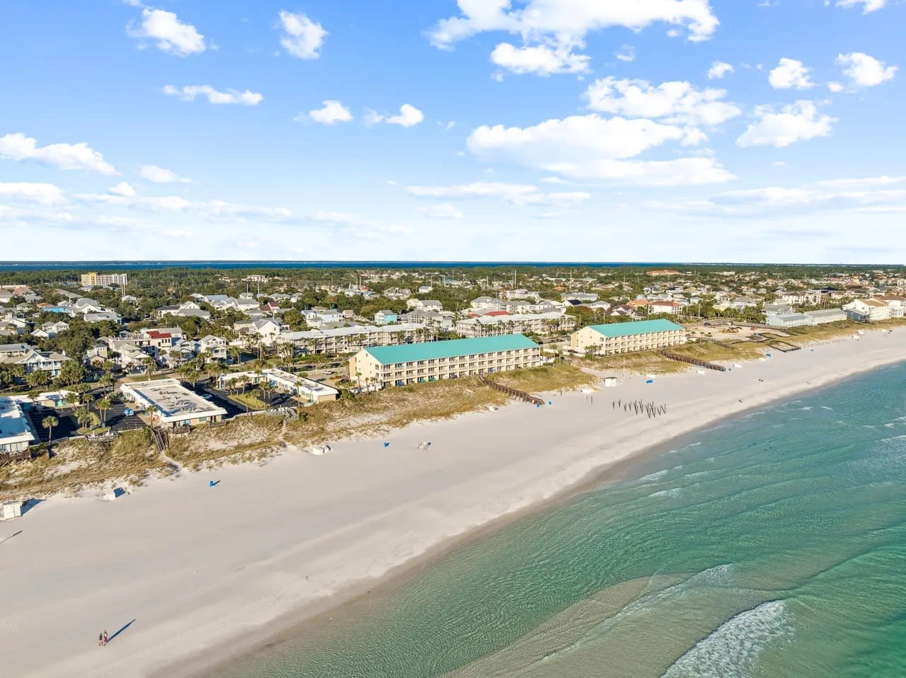 Step into a bold, designer living room where vibrant color meets luxury.