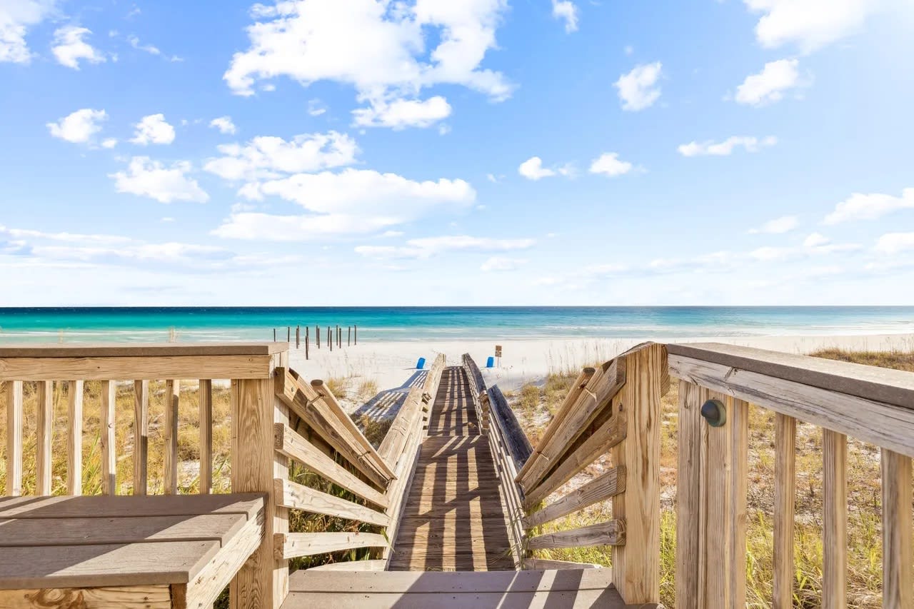 Step into a bold, designer living room where vibrant color meets luxury.