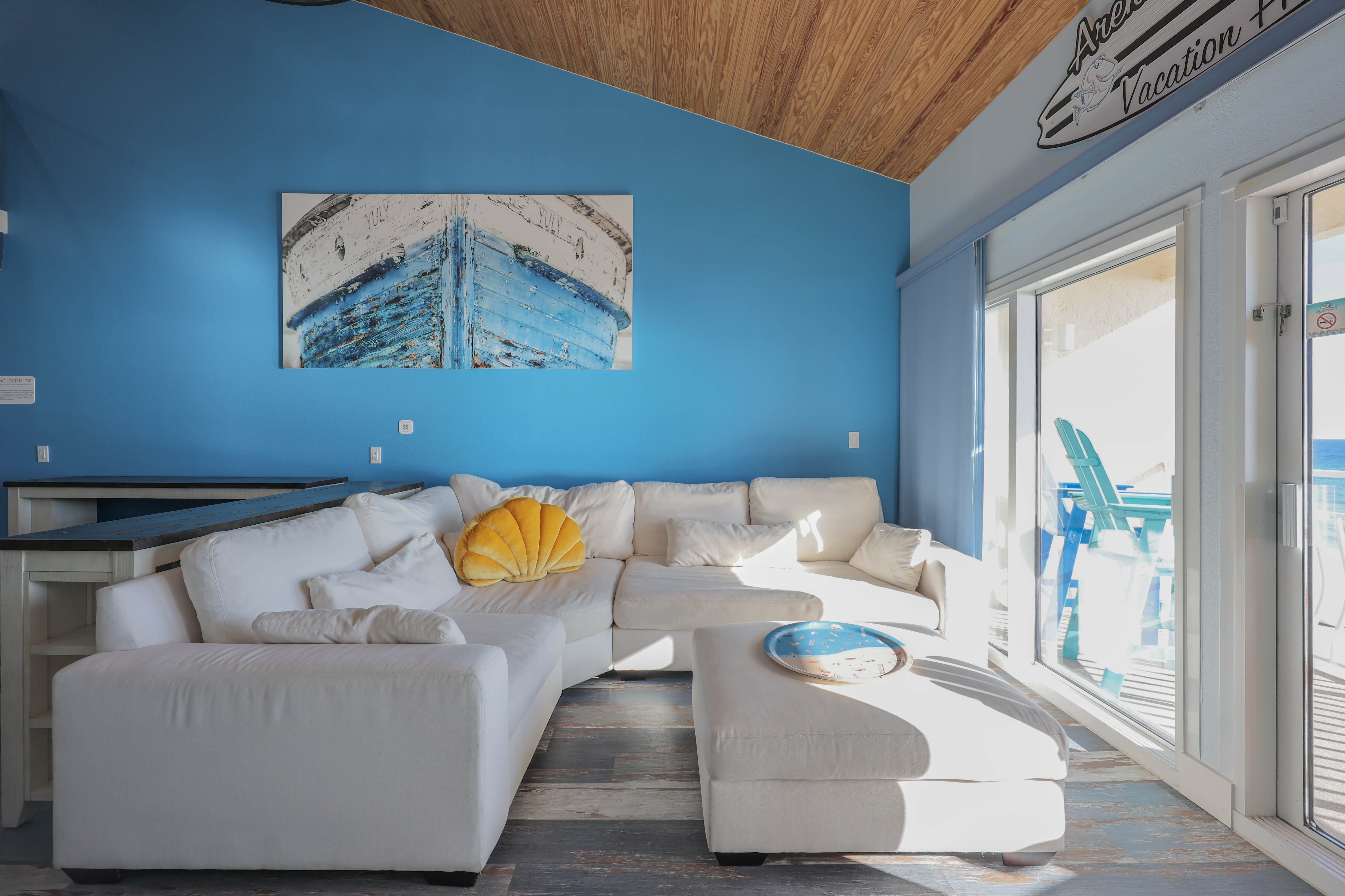 Step into a bold, designer living room where vibrant color meets luxury.