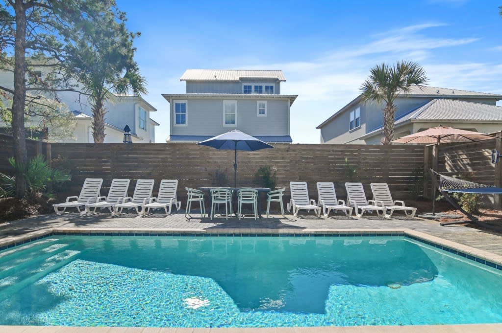 Private Pool with loungers, pool umbrellas and a hammock