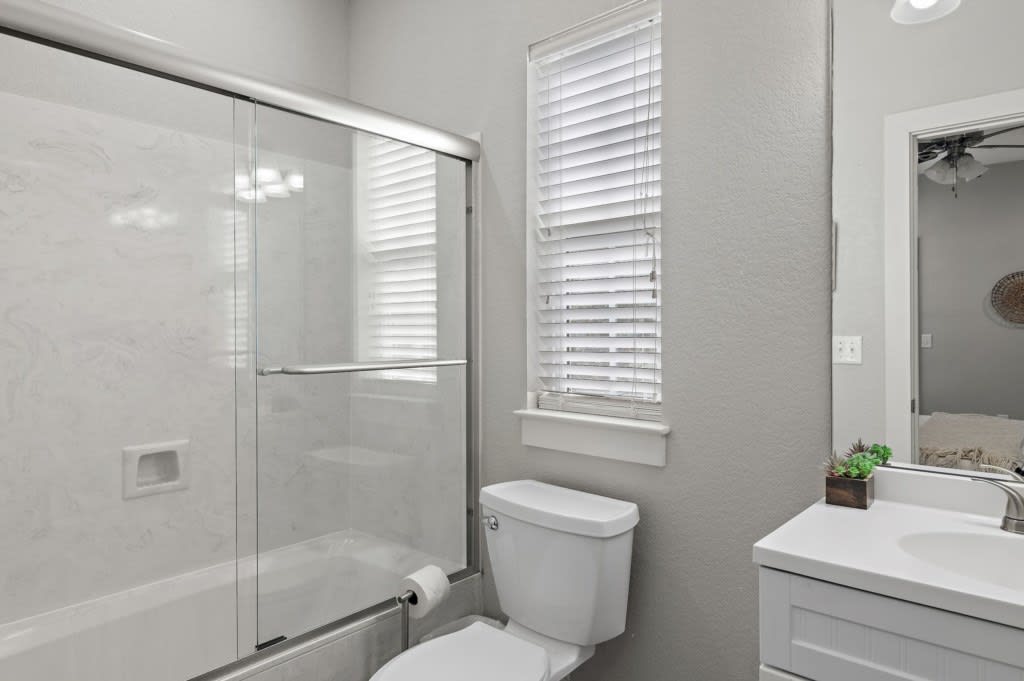 Bathroom #3: Private attached bathroom with shower/tub combo