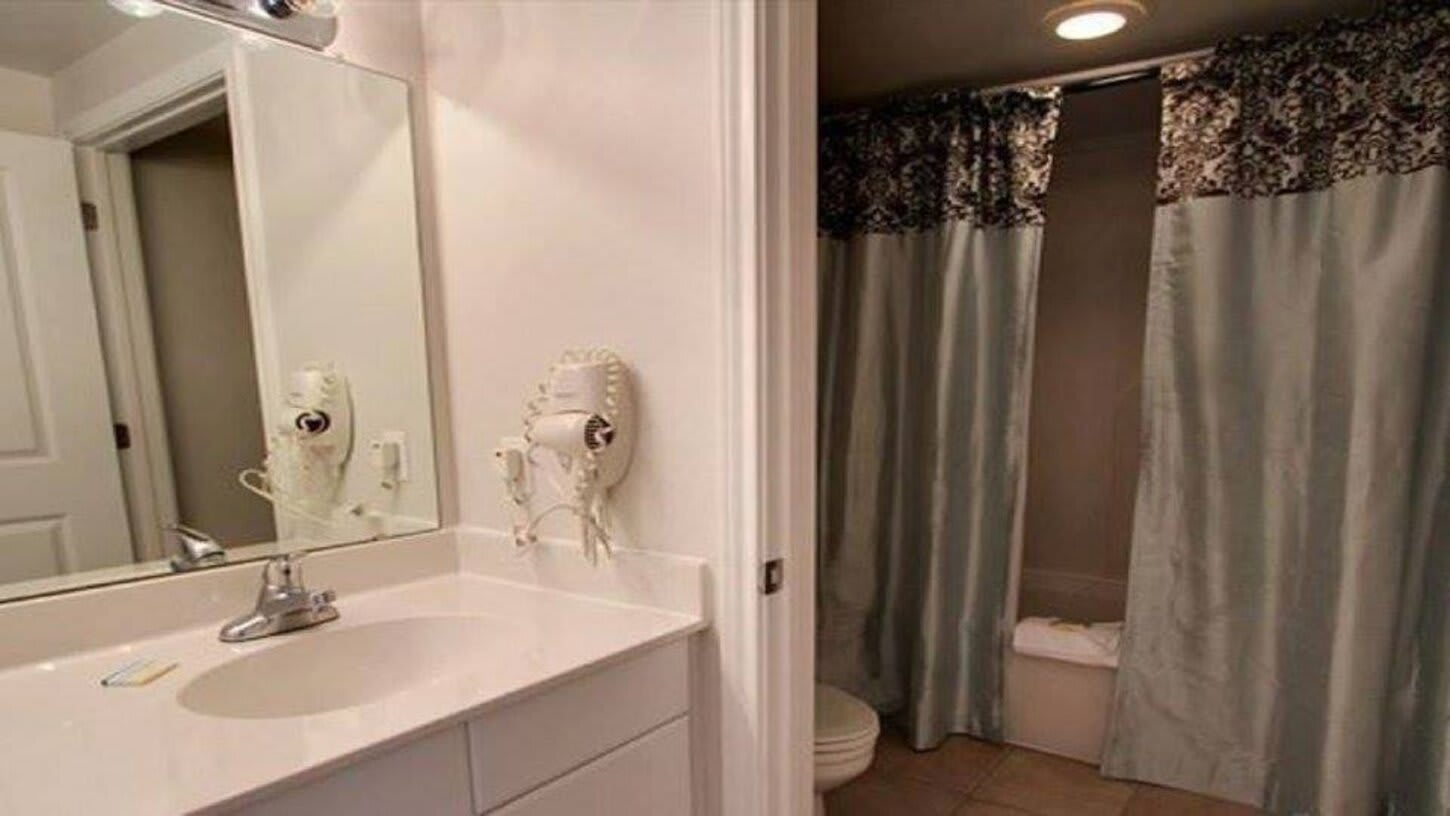 Large master. Separated by a door to the shower / toilet area