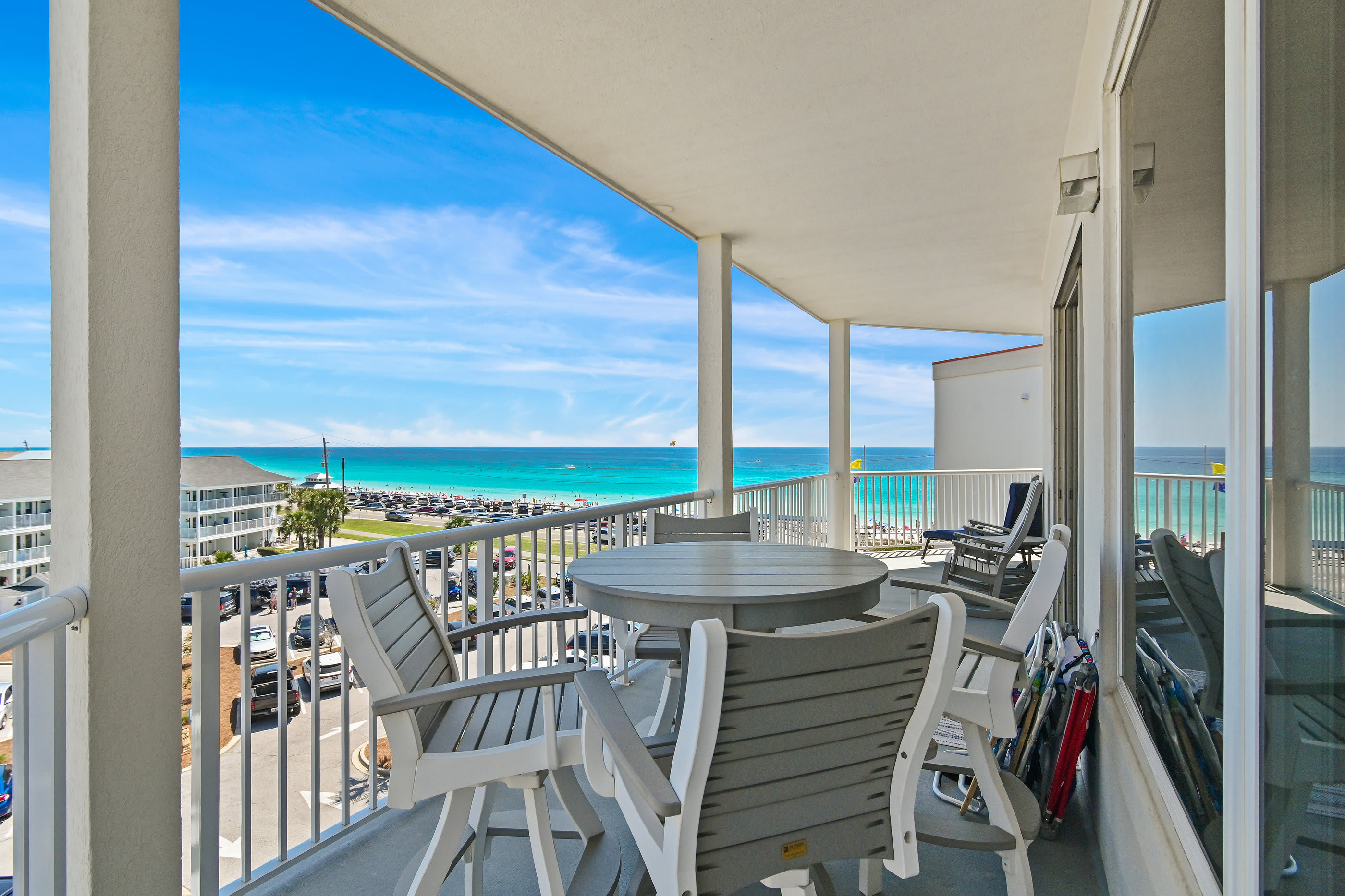 Gulf-front balcony with panoramic views and outdoor seating