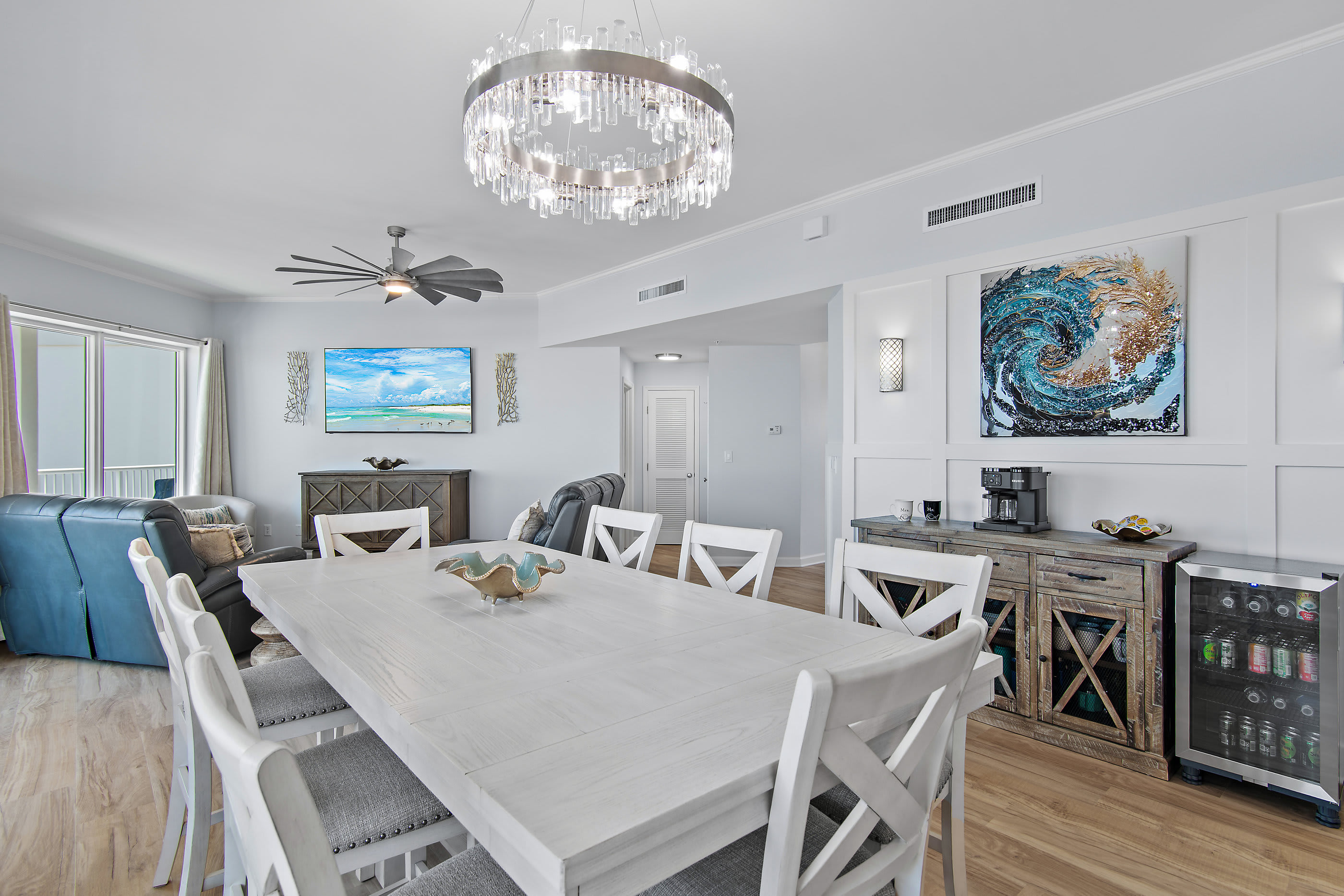 Dining area with seating for six and coastal chandelier